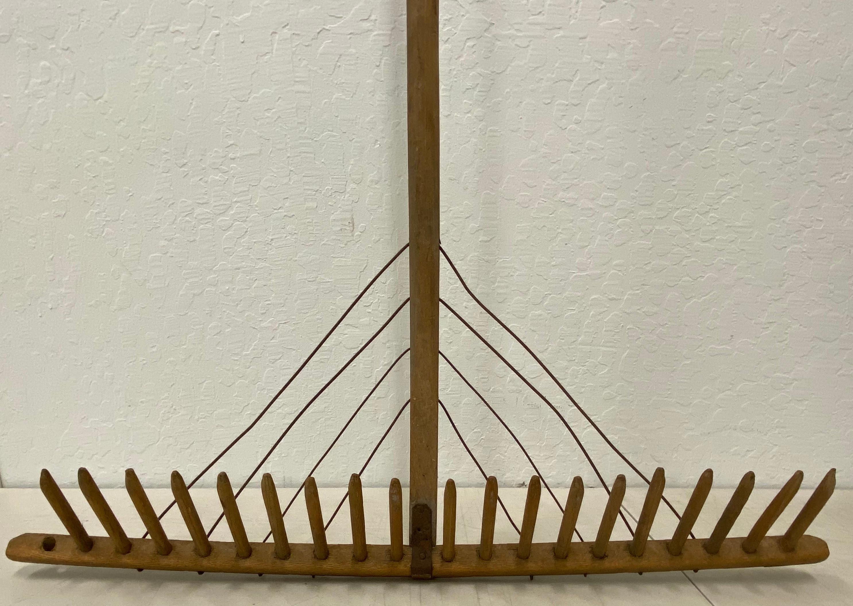 19th century handcrafted leaf rake

The rake is in fantastic antique condition with one single end tine missing (see pics)

The rake measures 30