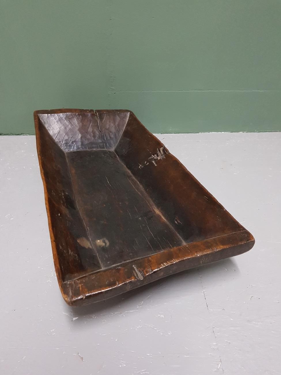 Old hand-cut wooden trough from the 19th century with a beautiful patina.

The measurements are,
Depth 30 cm/ 11.8 inch.
Width 62 cm/ 24.4 inch.
Height 12 cm/ 4.7 inch.
  