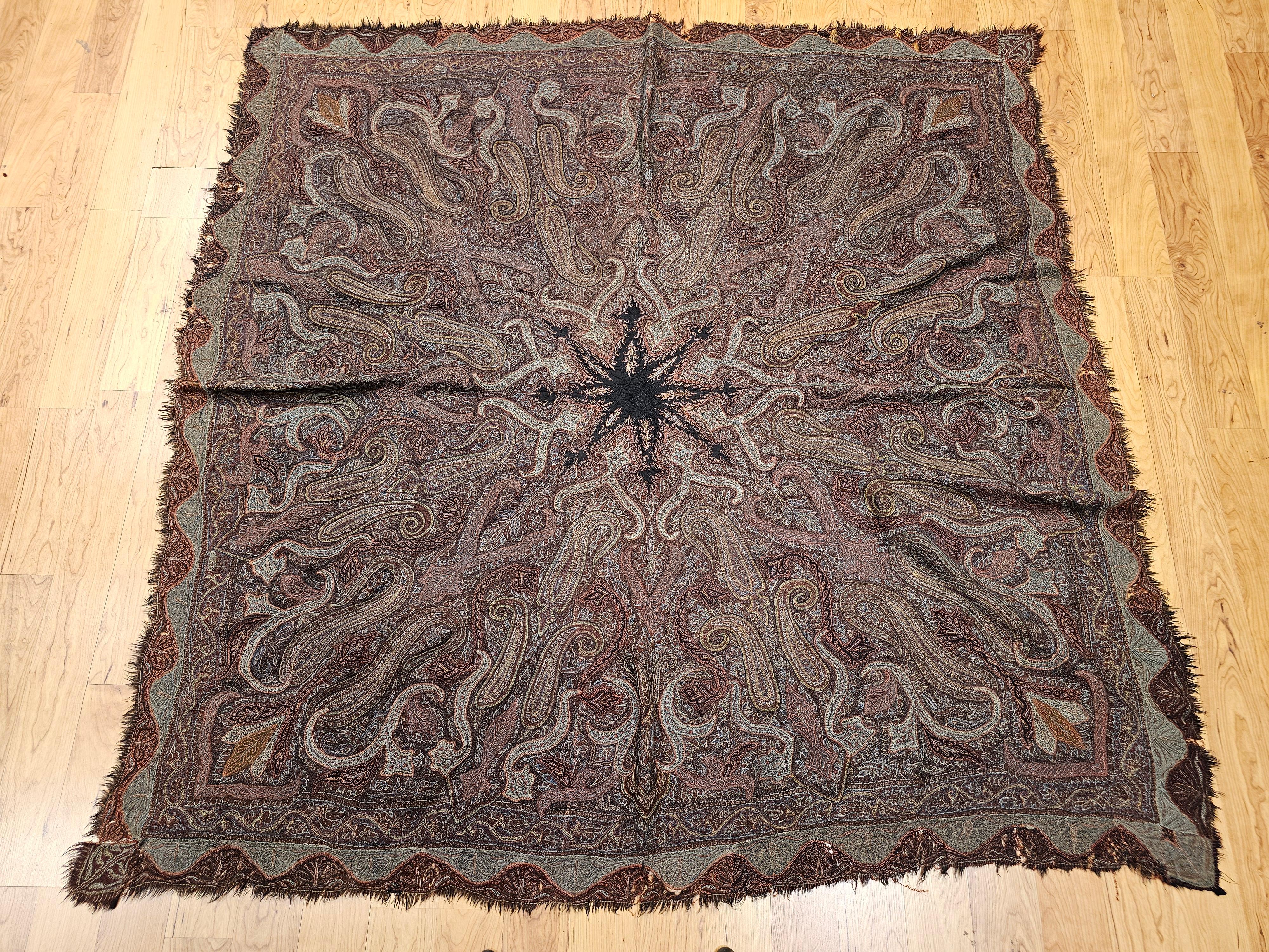 A rare and exquisite artifact of 19th-century textile craftsmanship, this hand-embroidered Kashmiri Pieced Shawl exemplifies the artistic and cultural sophistication of historic Kashmir. Composed of intricately hand-stitched antique textile