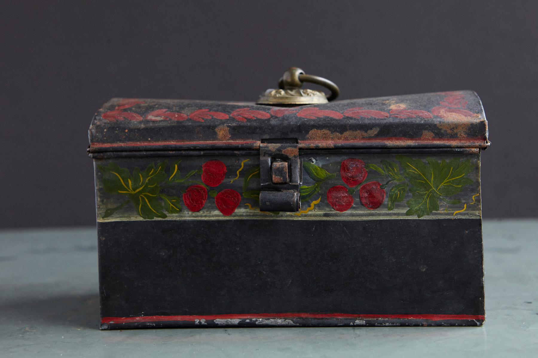 Second half of the 19th century dome top tole box for documents or deeds. The box is hand painted inside and outside and decorated with a detailed hand painted flower band.
  