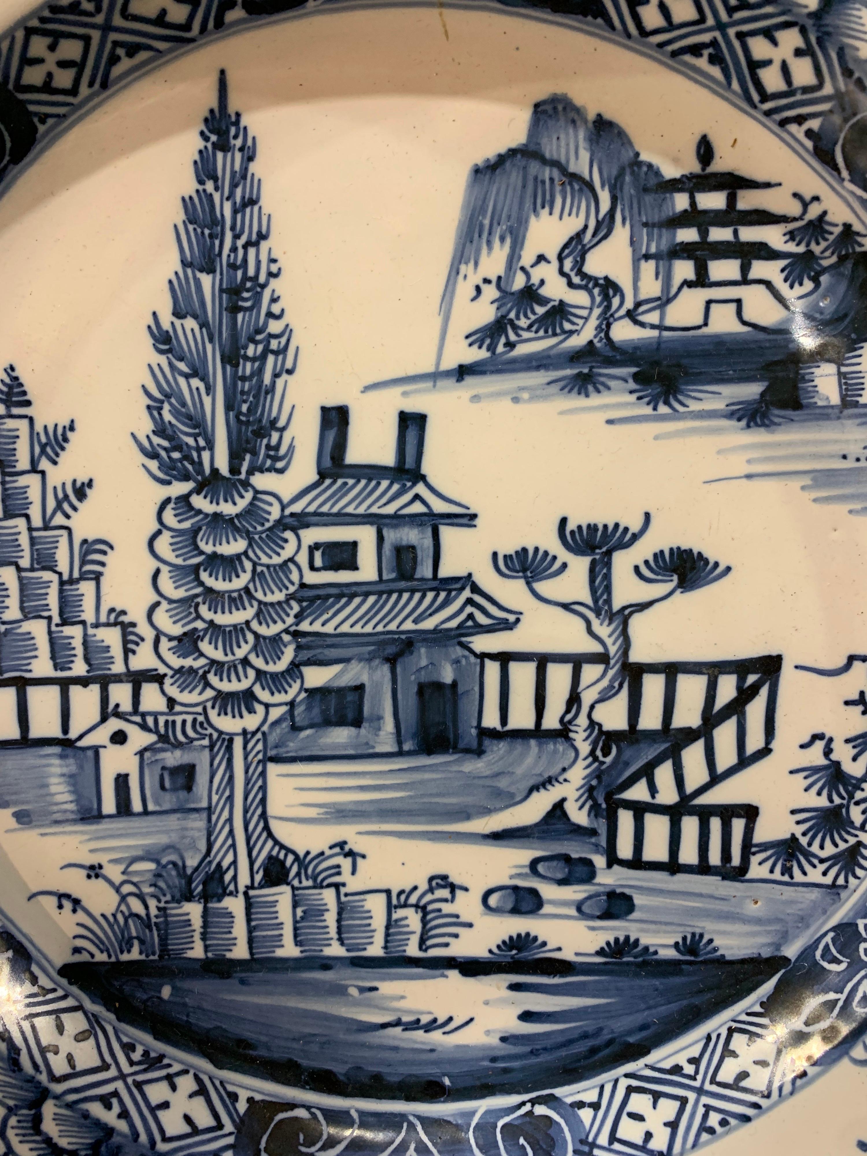 19th century hand painted English delft chinoiserie decorated charger.