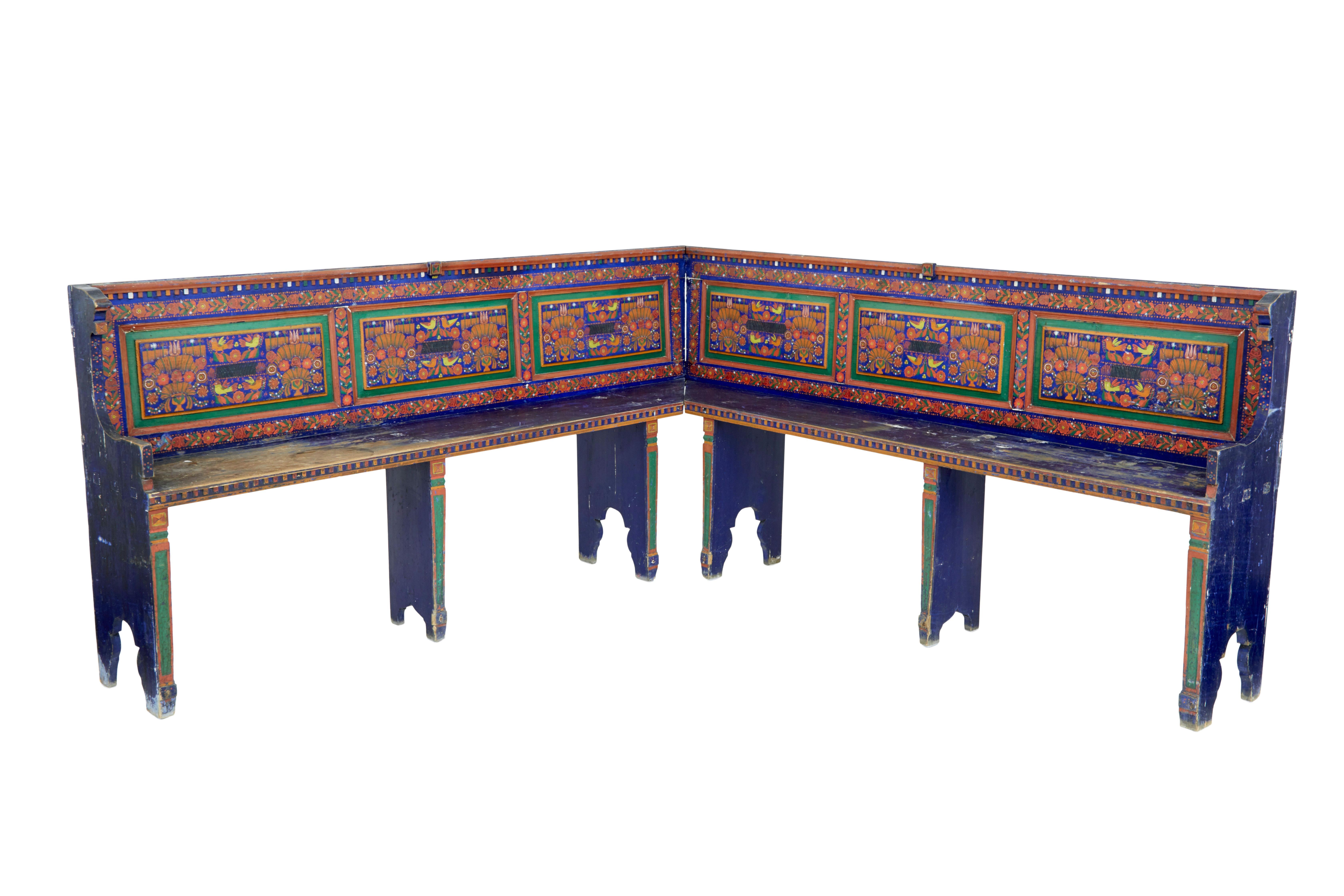 19th Century hand painted folk art corner seat circa 1880.

We are pleased to offer this rare traditional piece of hungarian furniture, hand painted in a blue / green and red colour scheme.

2 Benches interlock to form a 90 degree bench. Both