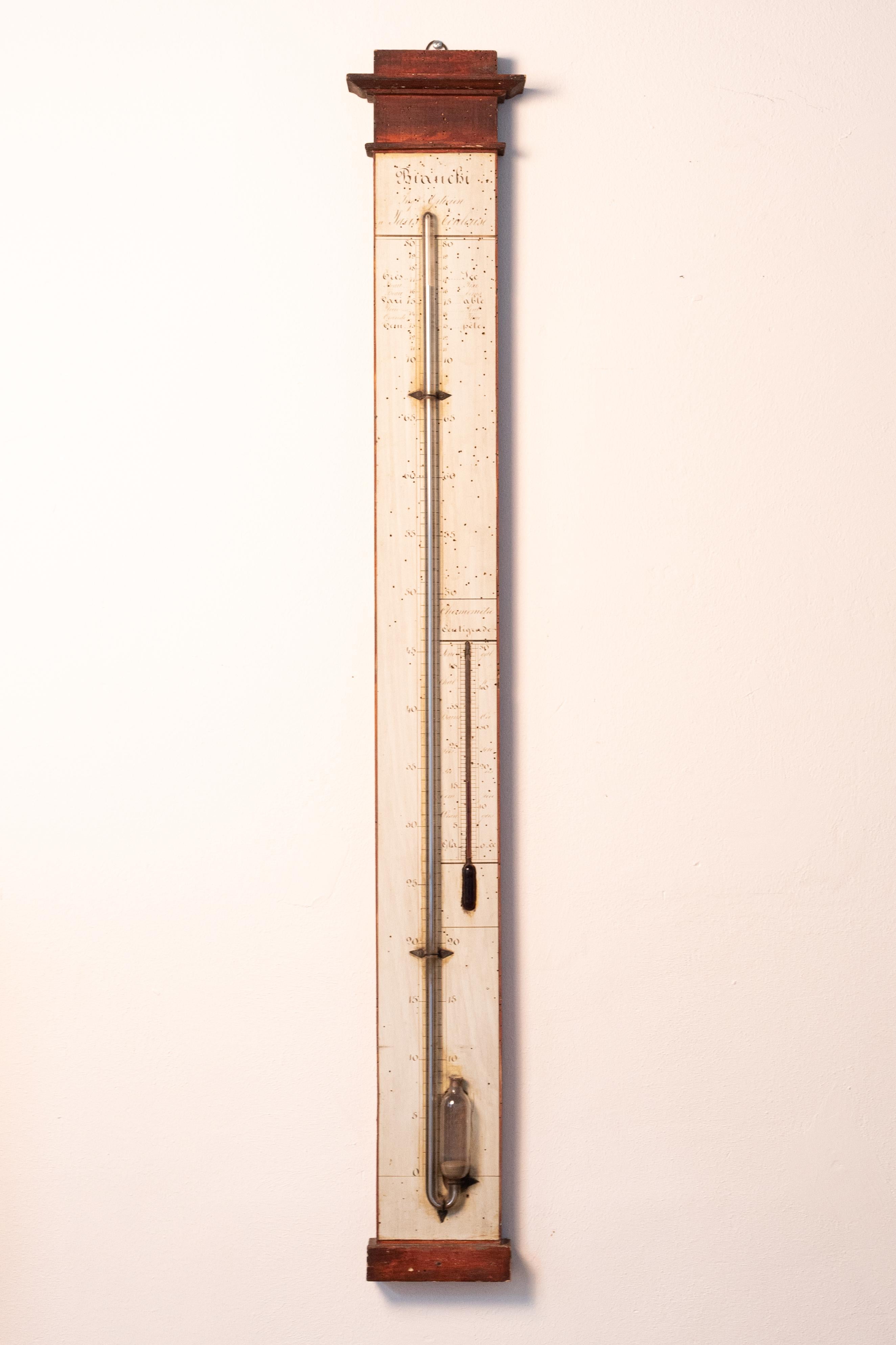 This hand-painted mercury thermometer/barometer dates from the first half of the 19th century. It was made by Bianchi, as can be read at the top of the thermometer. Very rare! 

Barthélémy-Urbain BIANCHI (1821-1898), engineer-optician, distinguished