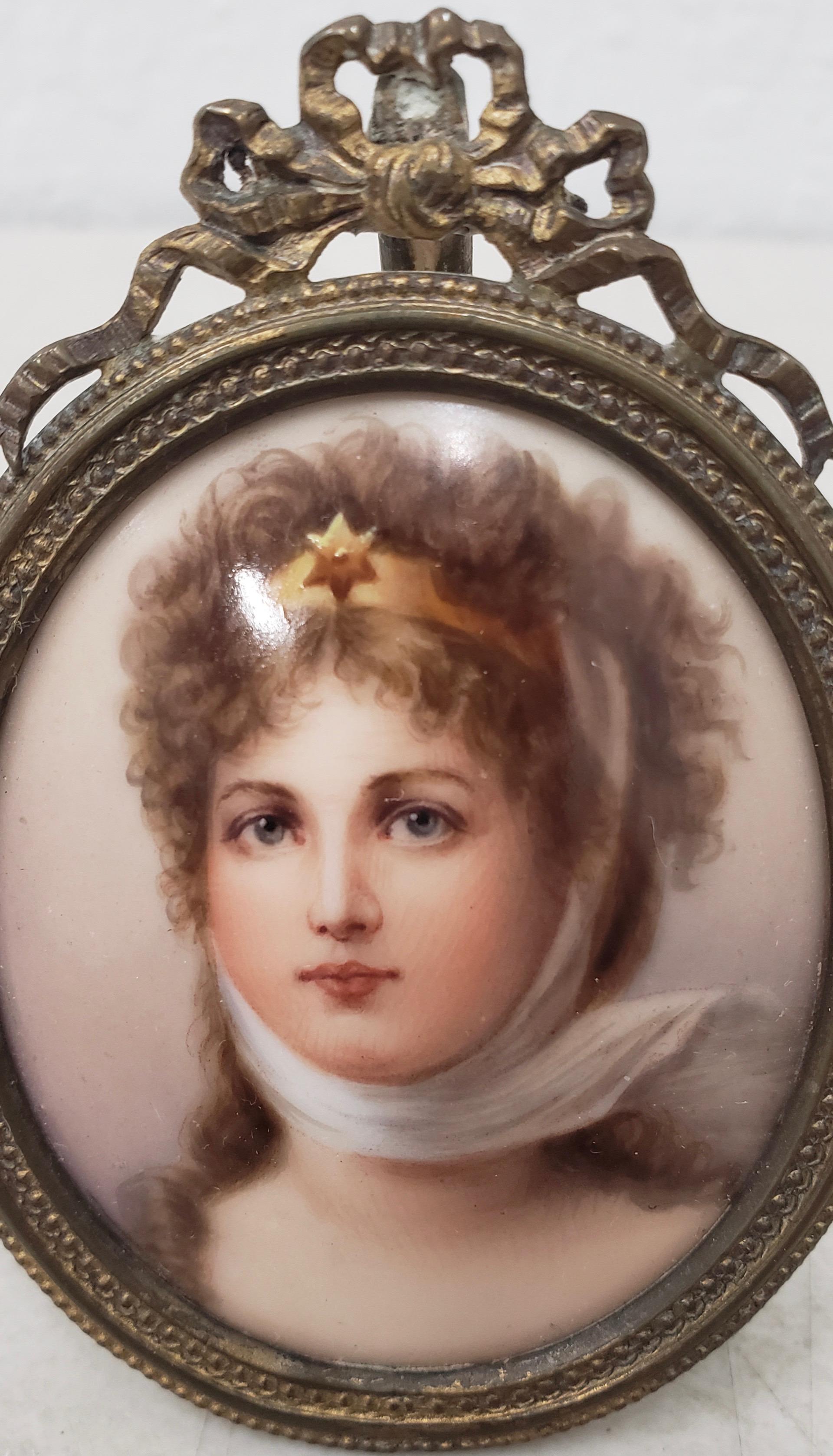 19th century hand painted miniature portrait on porcelain of a beautiful young lady

A stunning antique portrait miniature on porcelain of a lovely young lady with a star headband and silk scarf.

Dimensions: 2