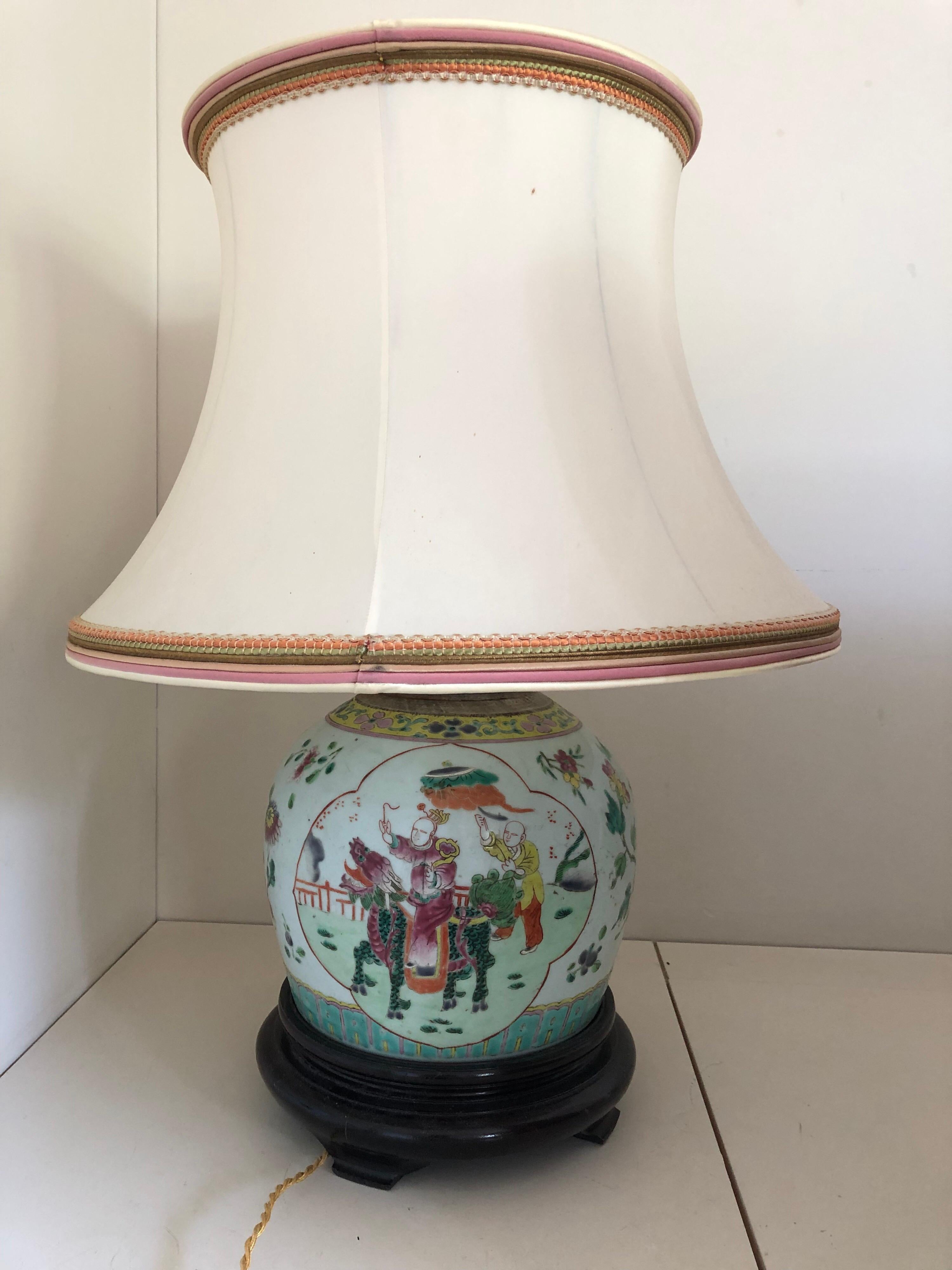 A very fine 19th century Chinese lamp with a dragon beautiful scene. Decorated with chinoiserie floral landscape. Now mounted as a lamp with wooden base.
There is a second one with another scene.