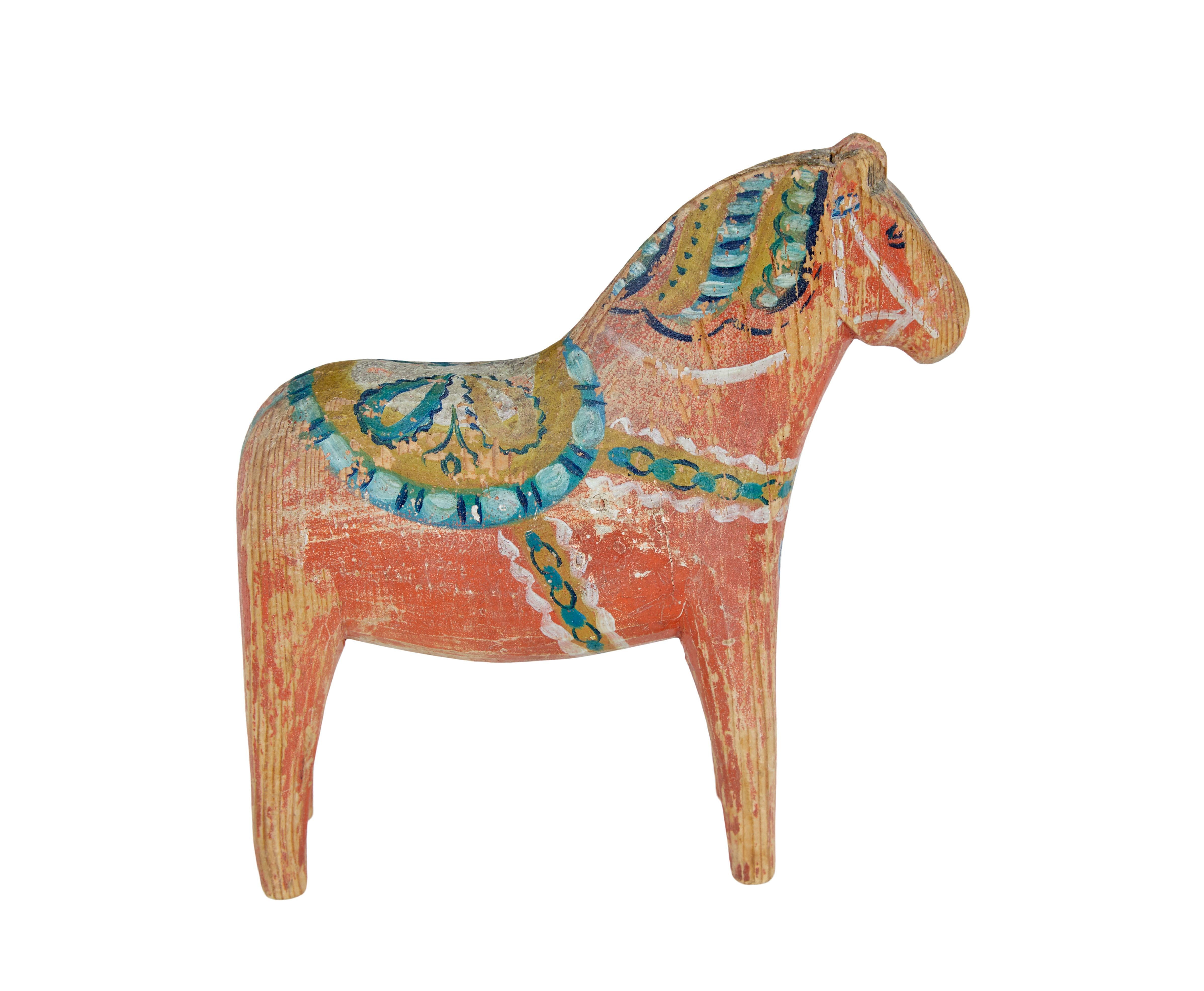 19th century hand painted Swedish Dala horse circa 1890.

Fine quality example bought from a collector of Swedish folk art.  Traditionally whittled in pine and hand painted using a 2 brush technique.  Typically being made in the Dalarna region of