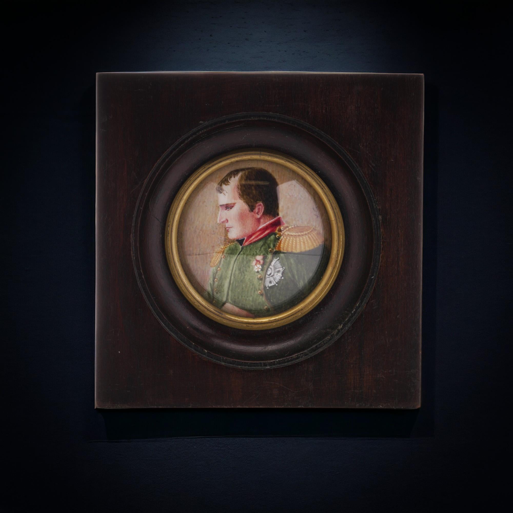 Antique 19th-century mahogany wood-framed hand-painted watercolour miniature portrait of Napoleon I. 
The miniature depicts a Napoleon I portrait turning his face to the right.
The back has not been opened to inspect. 
The signature is on the lower