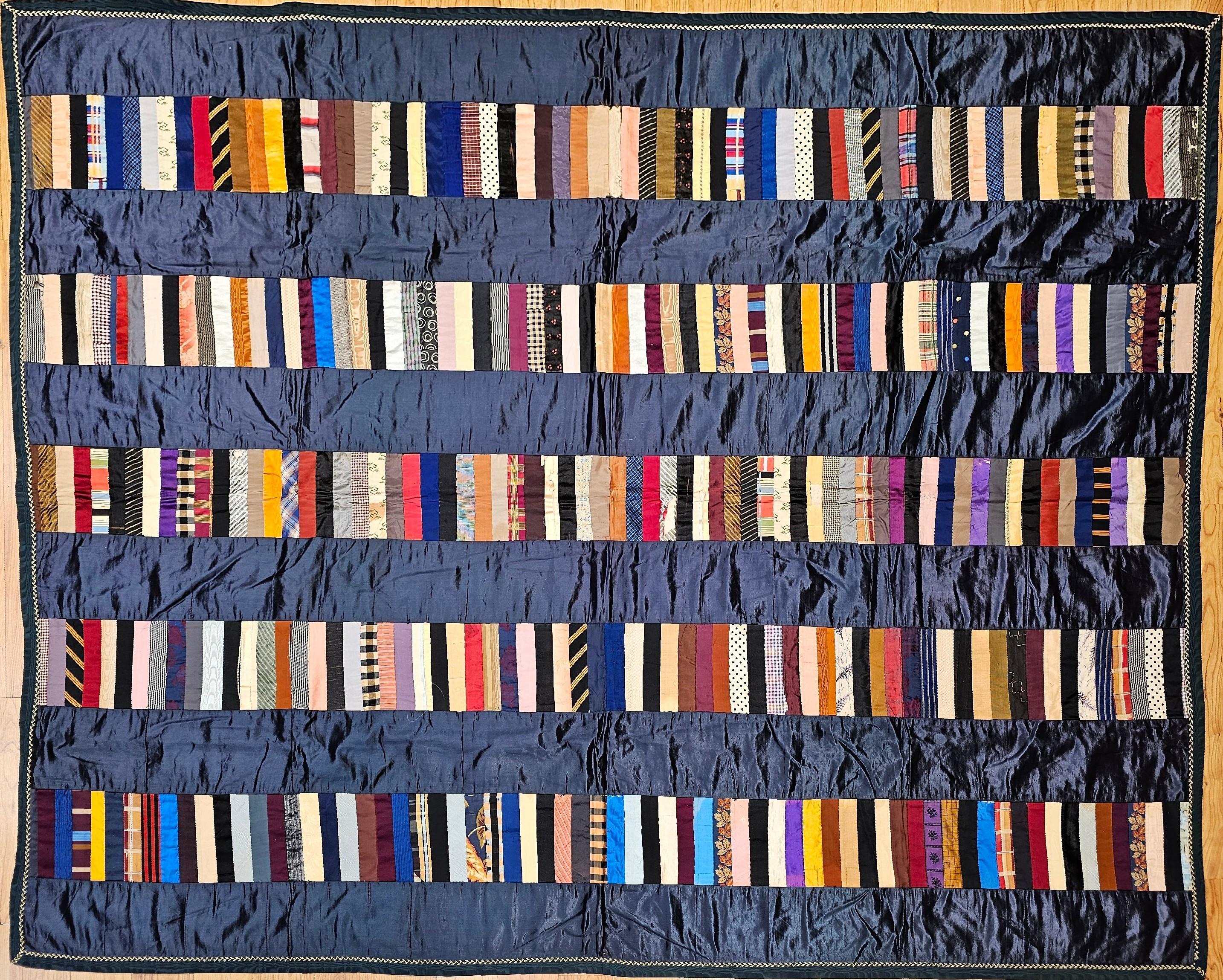 Celebrate the brilliance of American folk art with this exquisite hand-stitched silk quilt from the late 19th century. Crafted with exceptional skill and care, this quilt features an ultra-modern aesthetic that echoes the iconic “piece bars” style