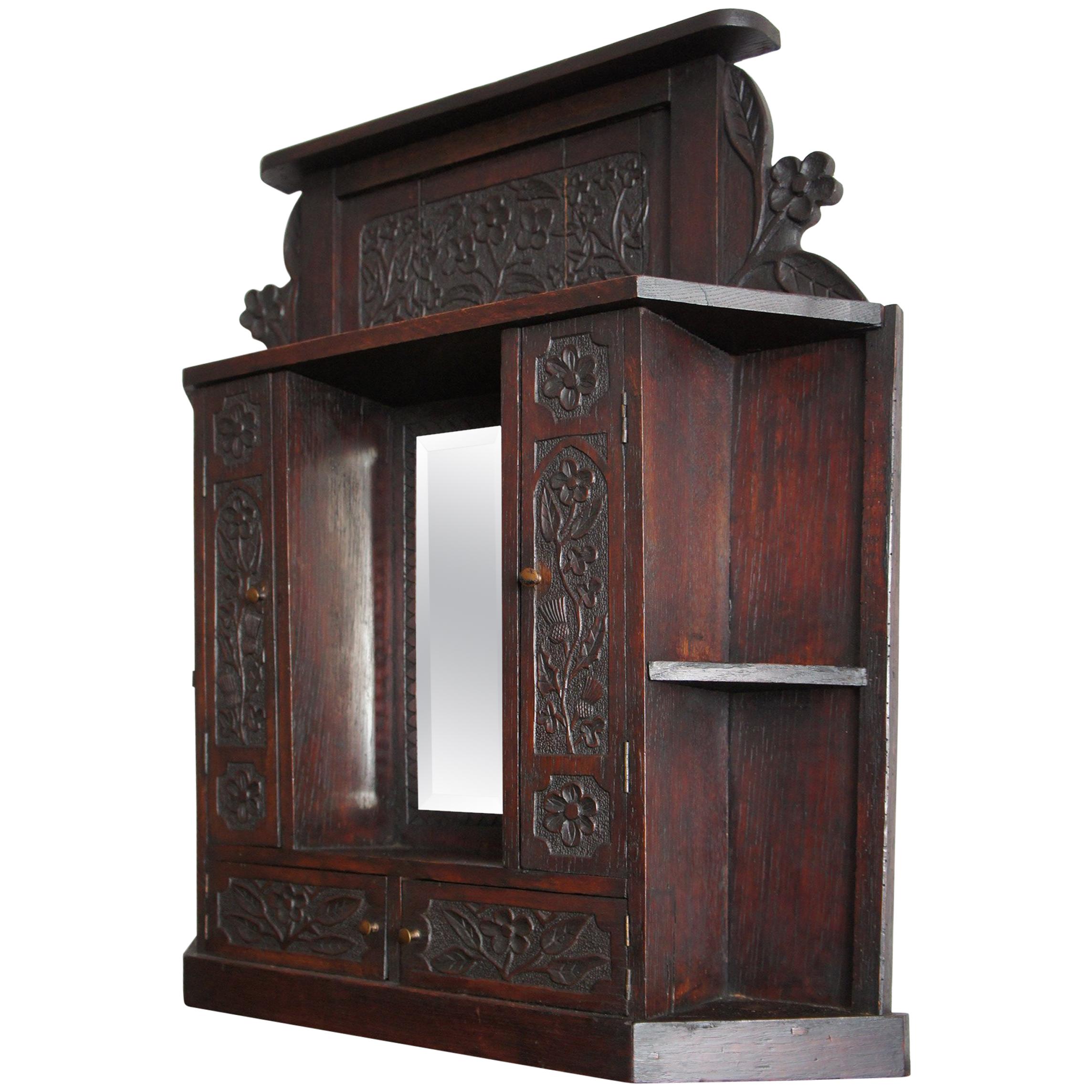 19th Century Handcrafted Oakwood Folk Art Wall Cabinet with Beveled Mirror