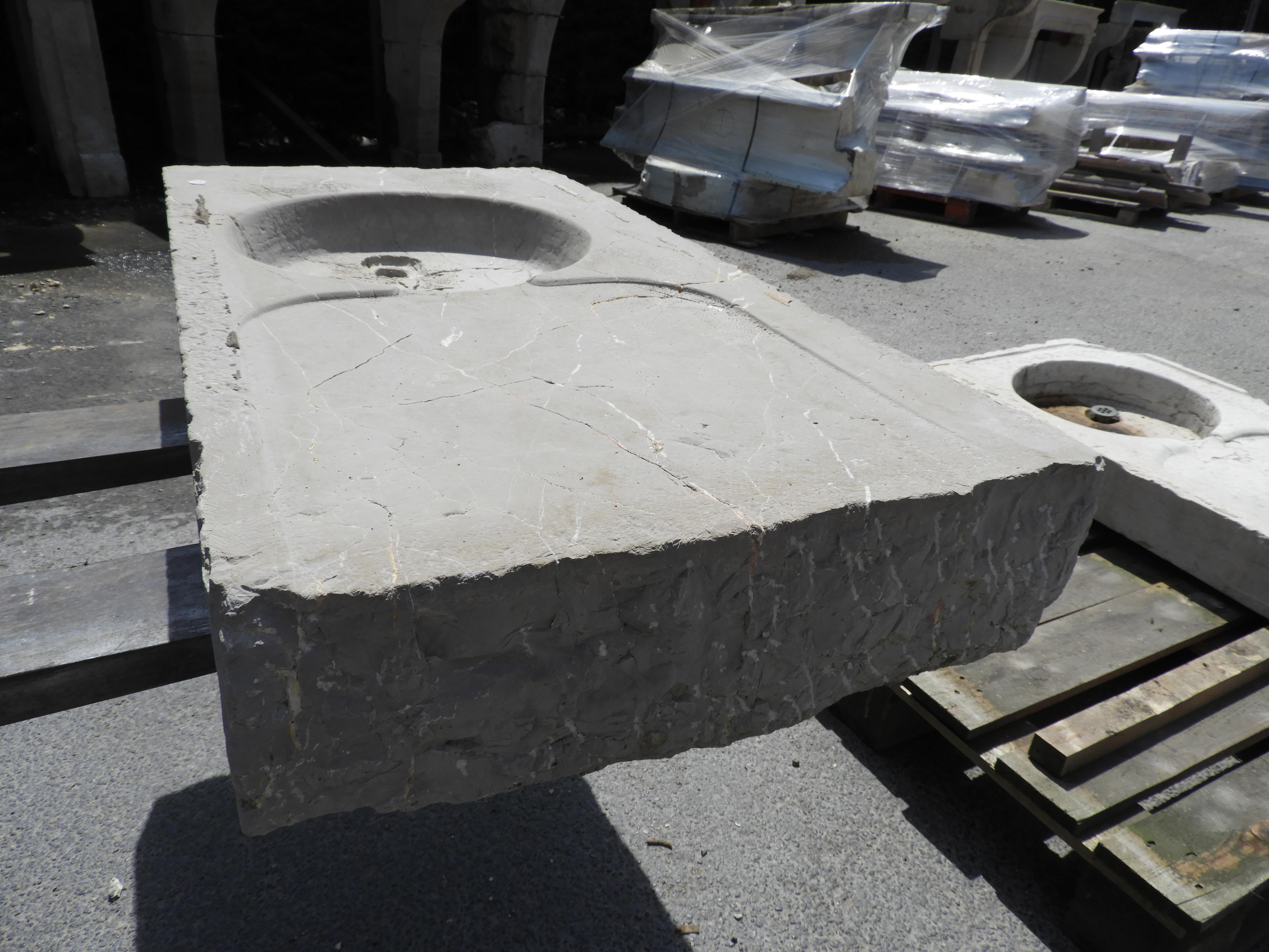 Solid hard limestone sink from the area of Lyon in France.