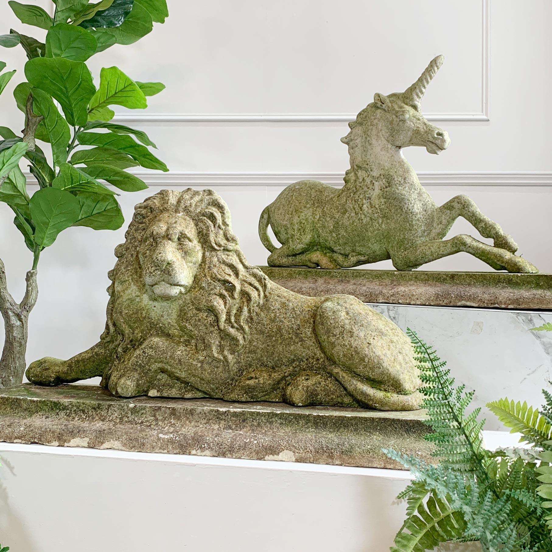 An outstanding pair of cast statues on associated plinths, possibly cast in Portland Cement, of the Unicorn of Scotland and the Lion of England. Since 1603 these have featured on the Royal Coat of arms, aside the Royal Standard. The incredibly