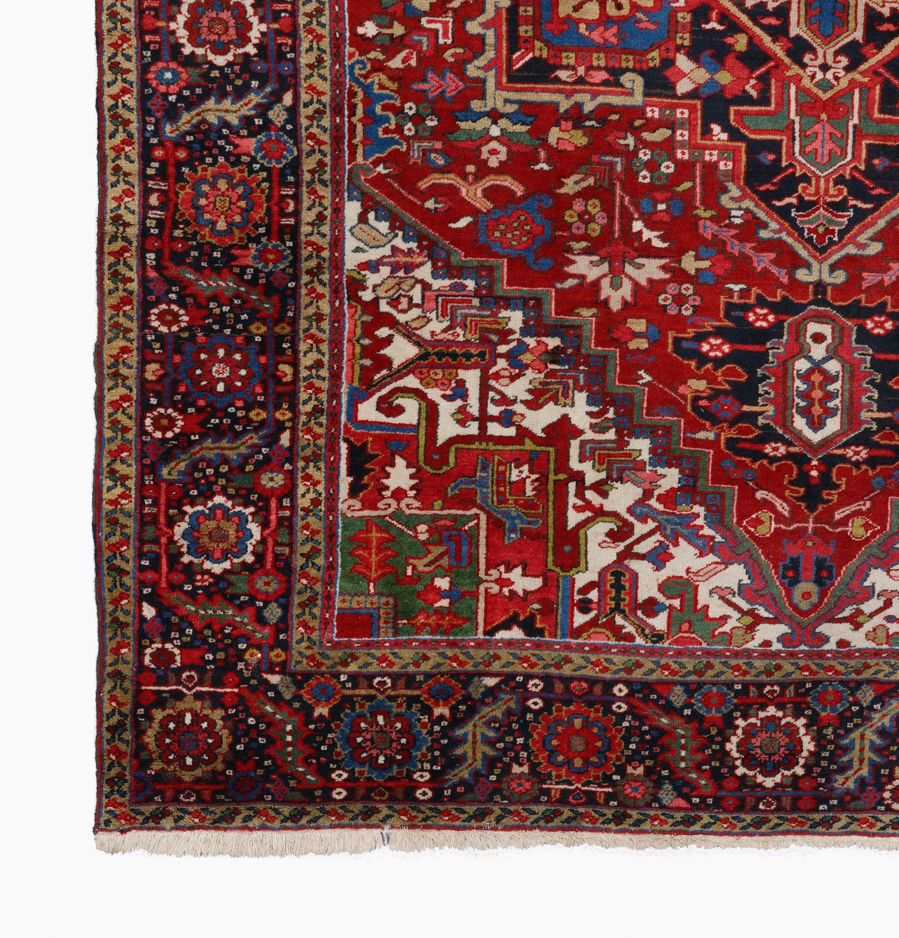 Antique Heriz Rug  Antique Rug
19th Century Heriz Rug in Good Condition 
Size: 236 x 332 cm

This Antique Heriz carpet is a work of art woven in the 19th century. This carpet, dominated by the color red, has geometric and floral patterns enriched