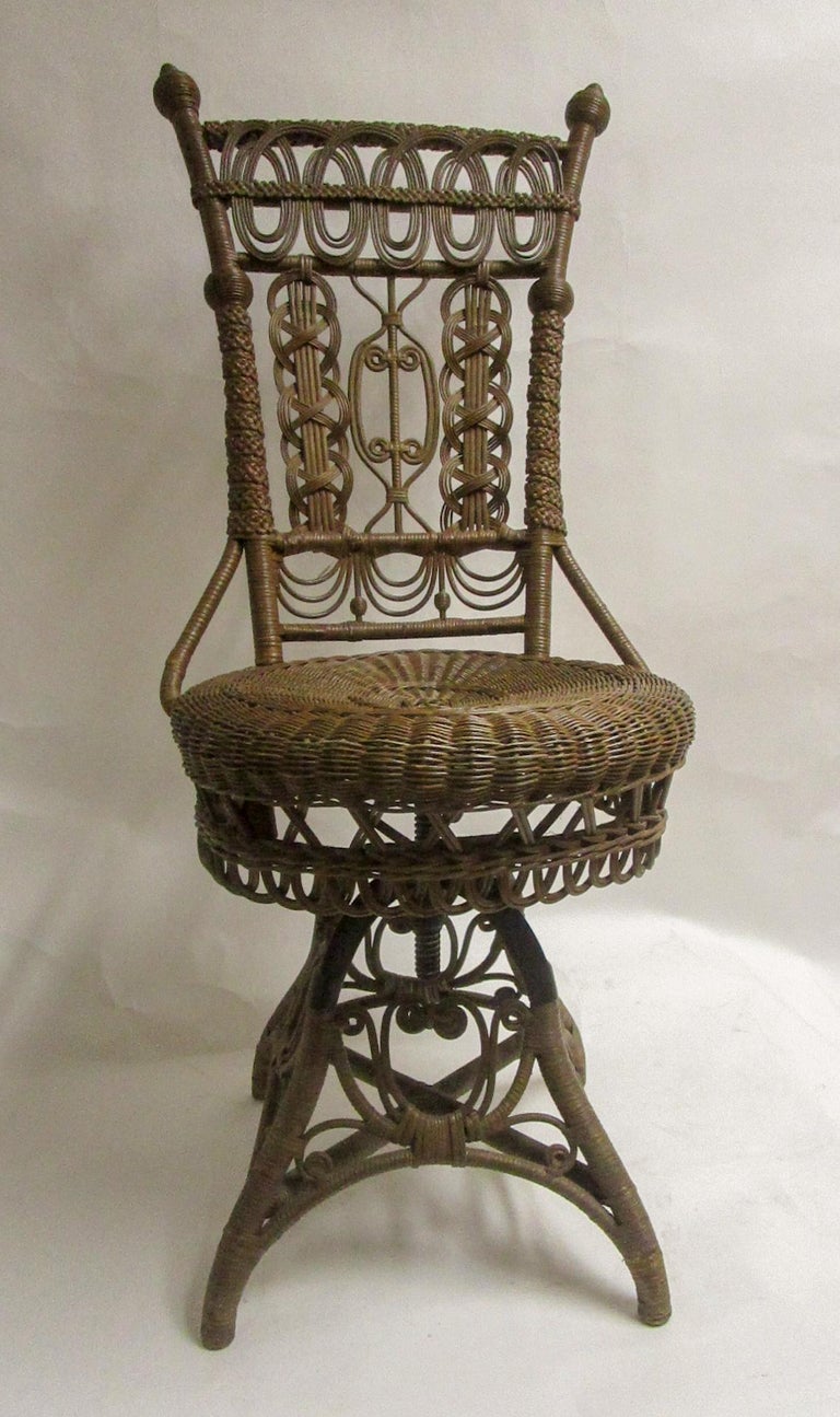 19th Century Heywood Bros. and Wakefield Co. Natural Wicker Swivel