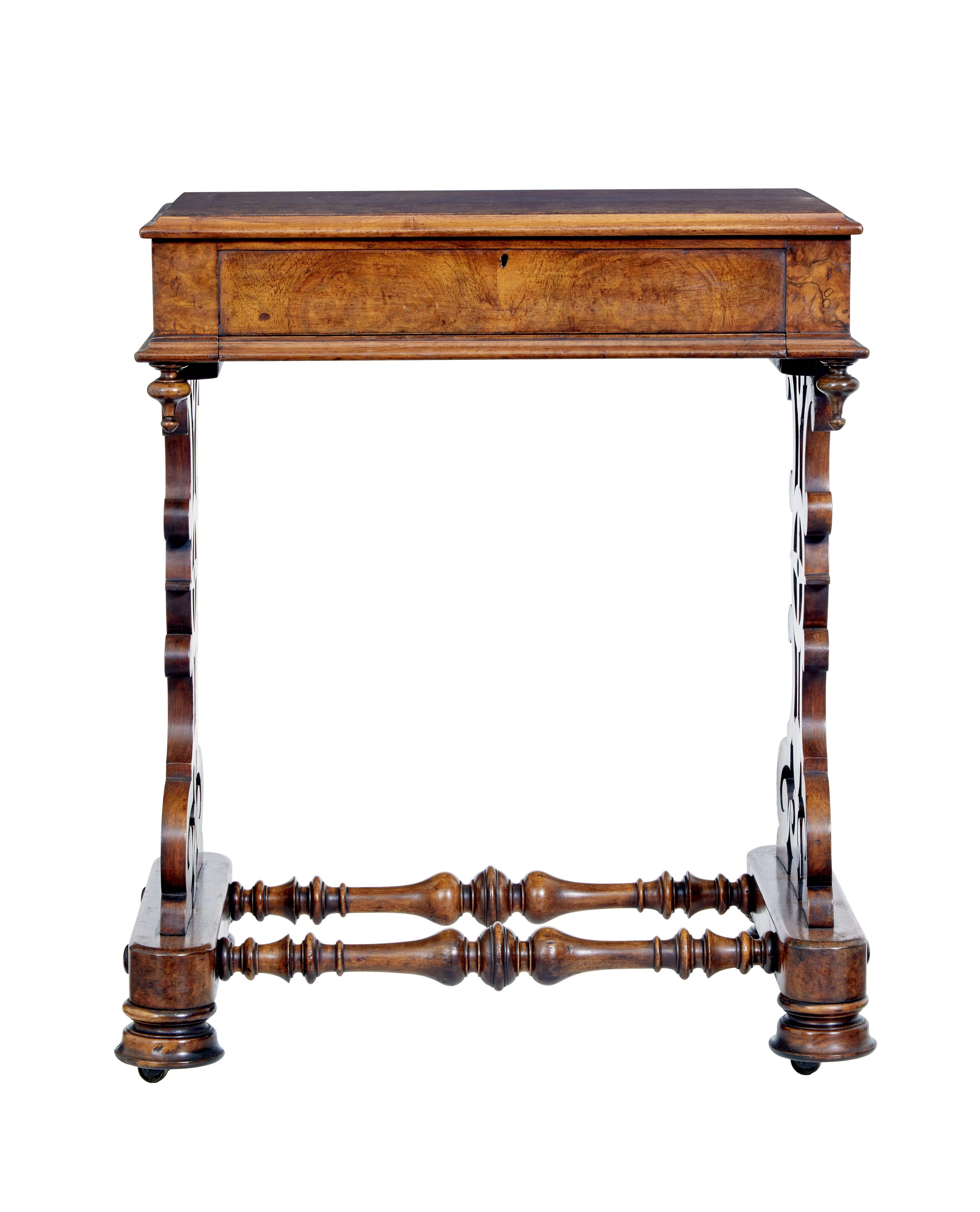 19th century high Victorian burr walnut occasional table circa 1870.

Fine quality high Victorian ladies work table.  Burr walnut top of rich colour and patina, lid opens to reveal a partitioned fretwork satinwood interior which cover the various