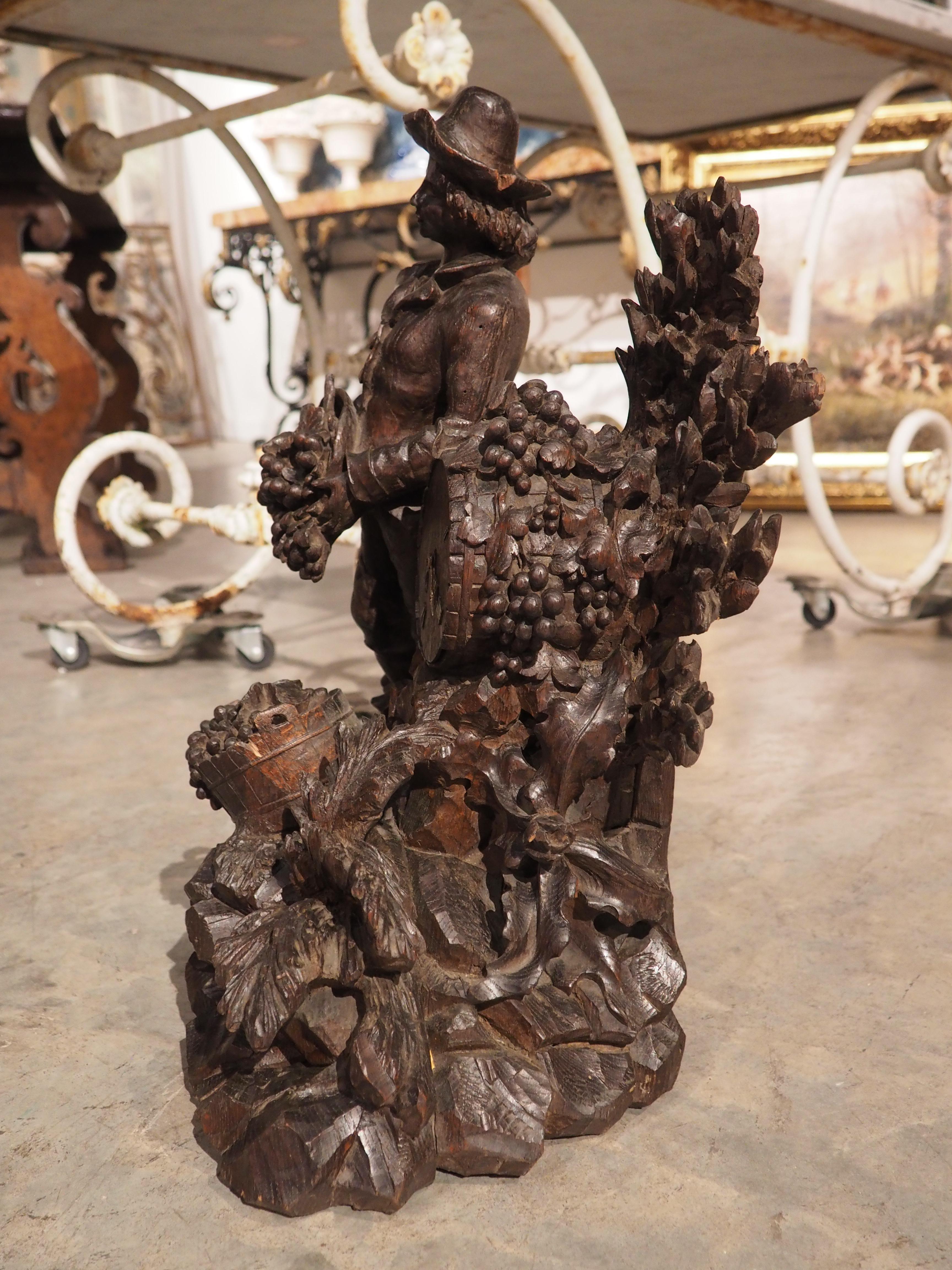 Wood 19th Century Highly Carved French Oak Sculpture of a Man Harvesting Wine Grapes For Sale