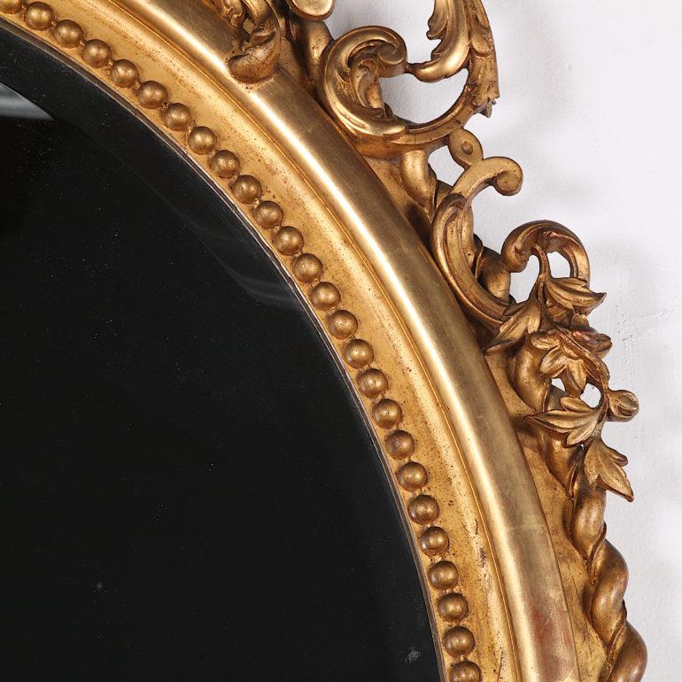 19th Century Highly Carved Gilt Oval Mirror In Good Condition In Vancouver, British Columbia