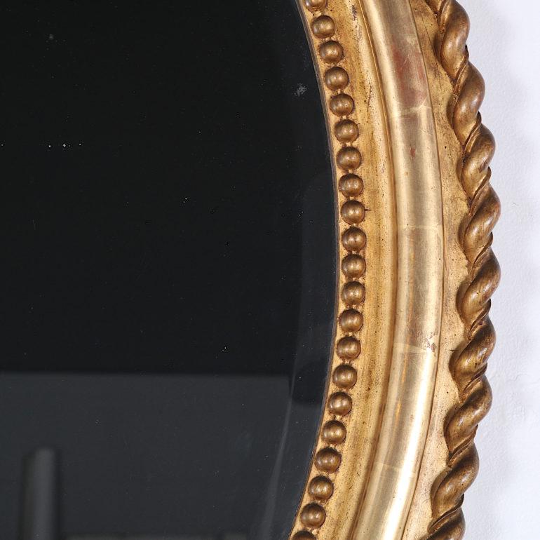 Late 19th Century 19th Century Highly Carved Gilt Oval Mirror