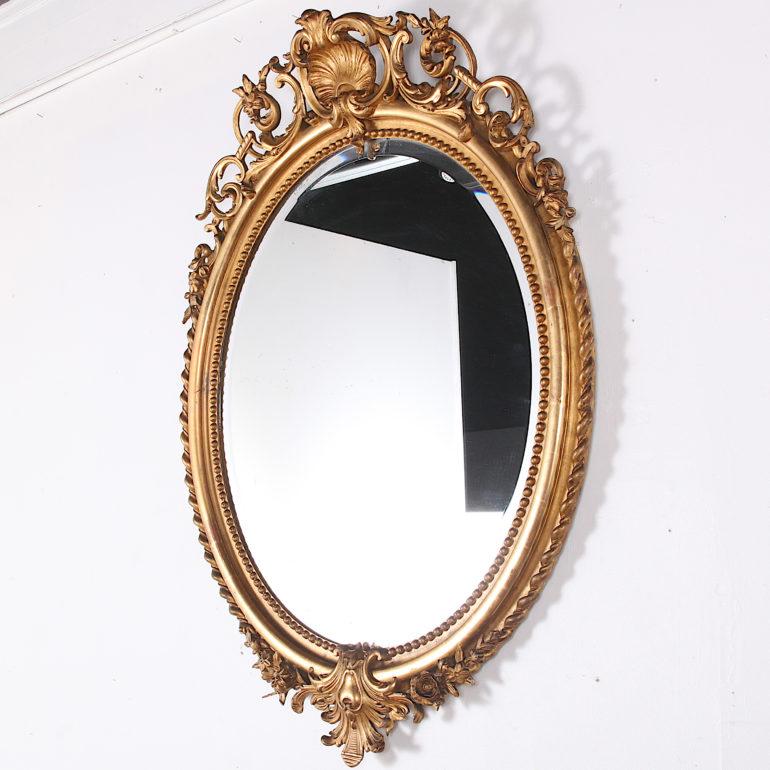 Giltwood 19th Century Highly Carved Gilt Oval Mirror