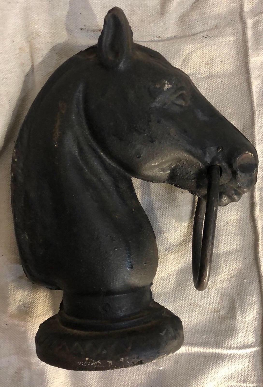 19th century horse head cast iron hitching post, American.