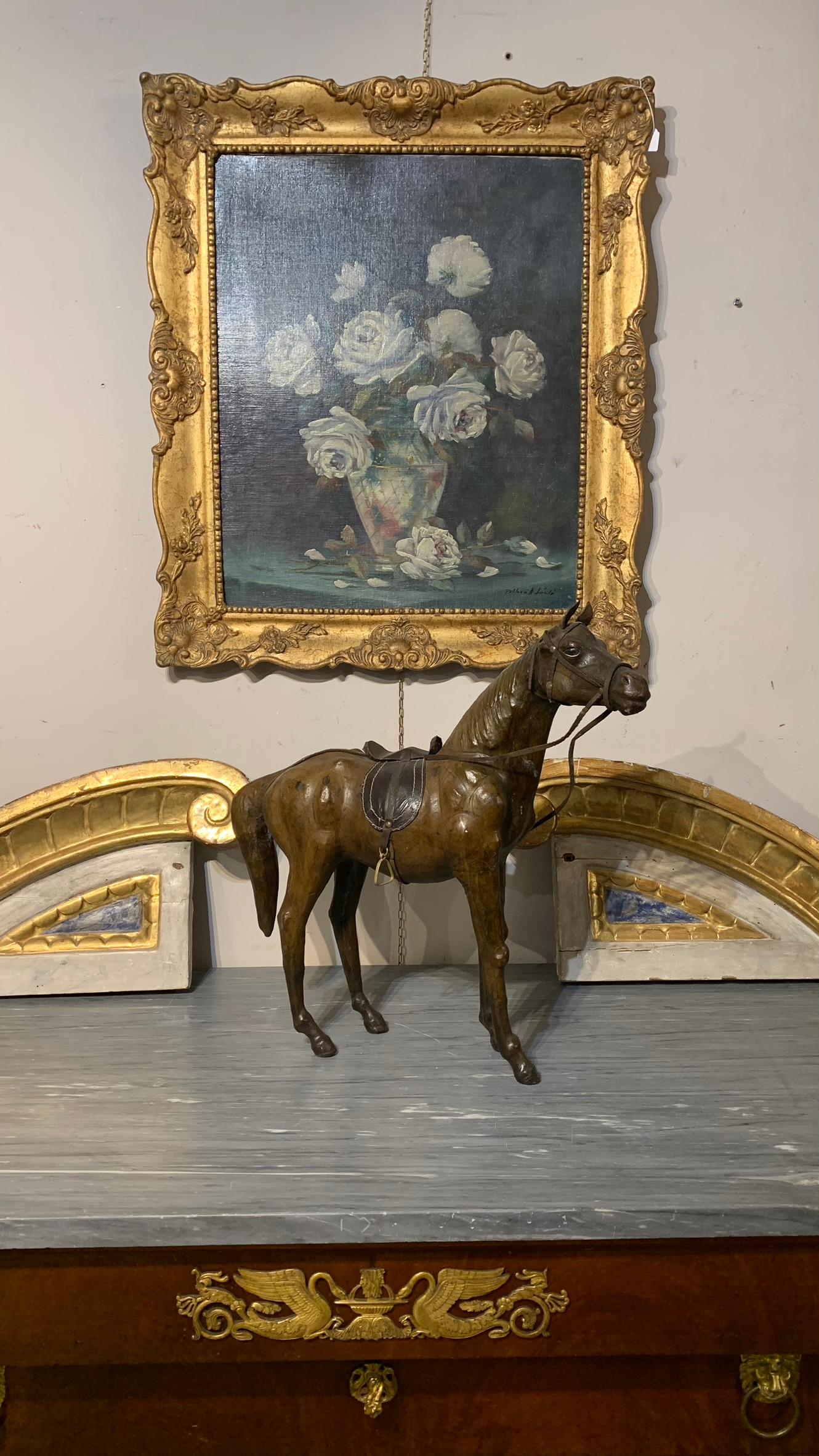 Beautiful horse model in papier-mâché covered in hand-crafted leather. You can see the attention to detail in the reproduction of the animal, and in its accessories such as the bridle and saddle. It is ascribed to 19th century Italian