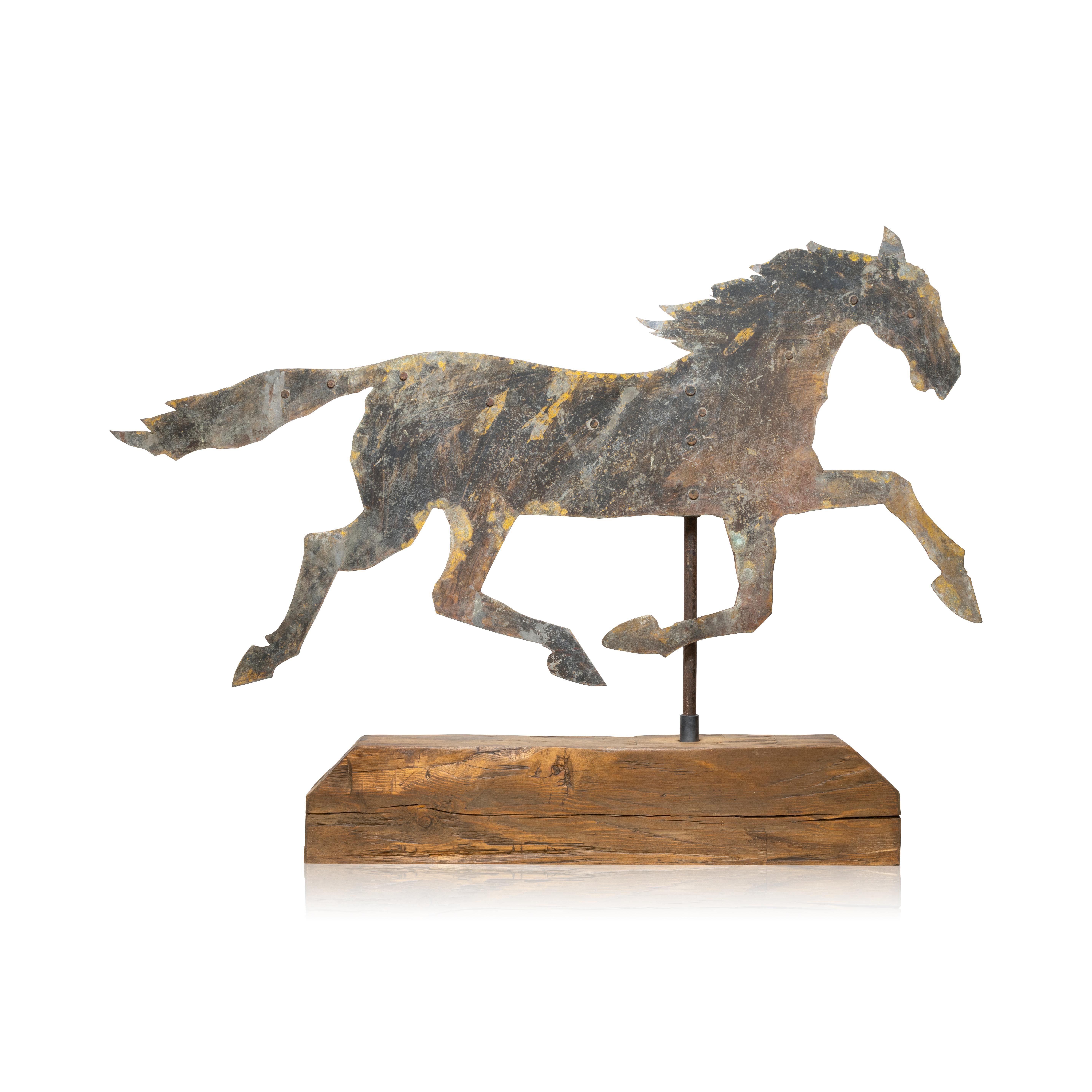 19th Century sheet iron silhouette horse weather vane with original iron mounting rod. Mounted on a more modern base. 32
