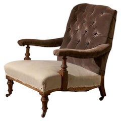 Poltrona con braccioli aperti in stile Howard and Sons del XIX secolo