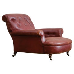 19th Century Howard & Sons Club Armchair in Red Moroccan leather.