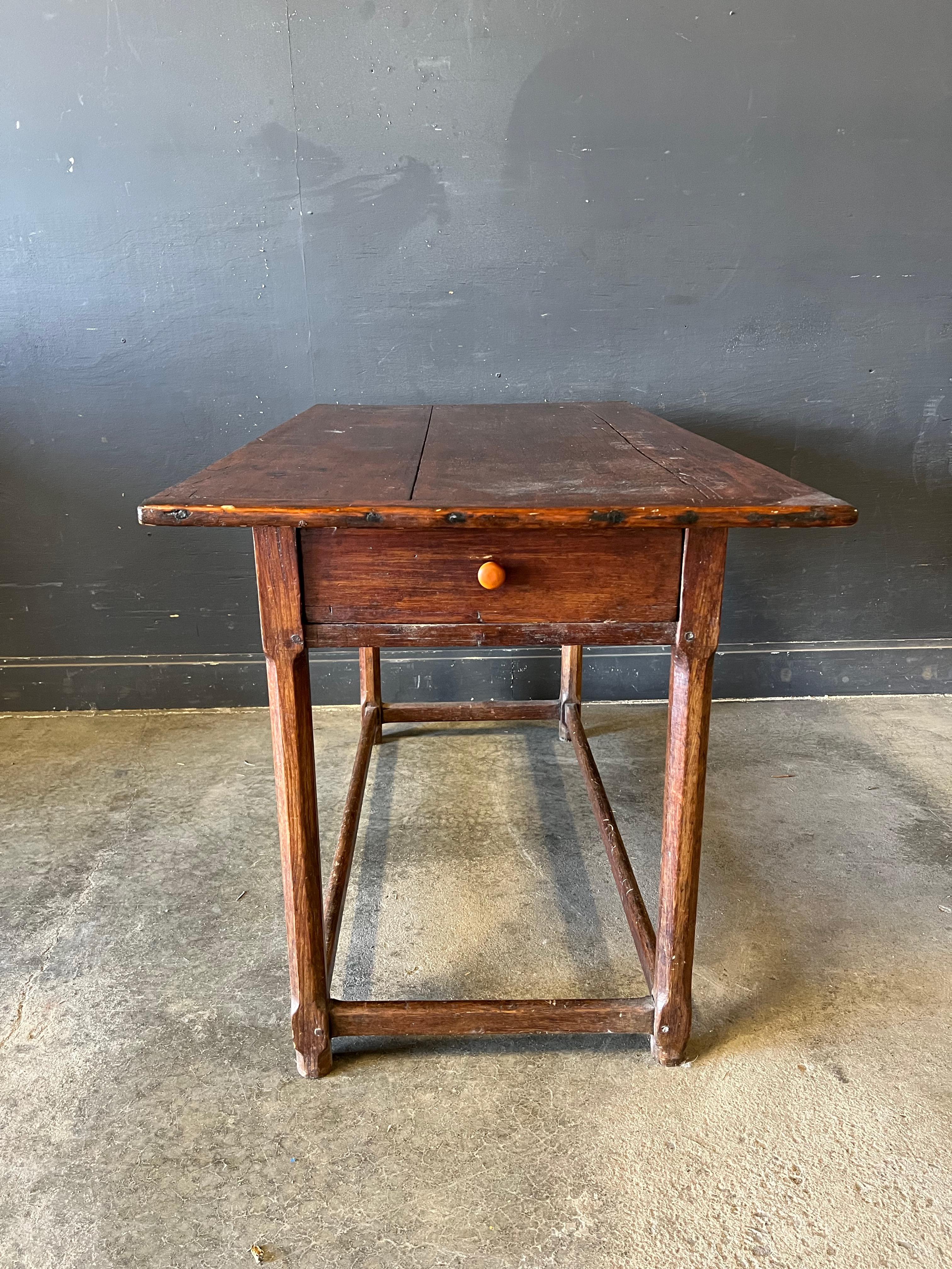 Early Hudson Vally Country Table or Desk with Drawers and Stretchers. Charming table with stretchers all around base and drawer on one side. Well worn top with square nail construction showing 19th century fabrication.