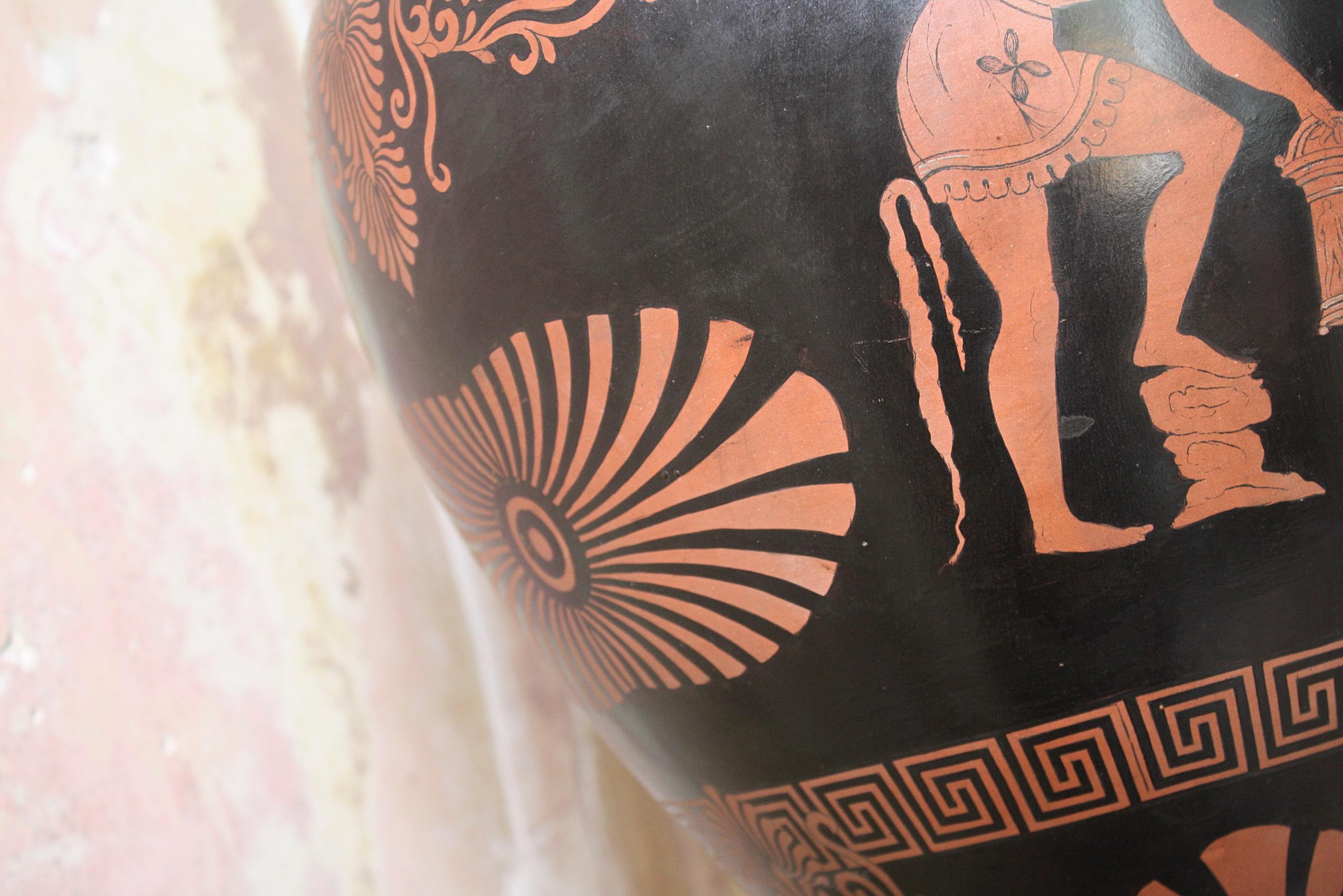 A huge grand tour Terracotta amphora vase, with typical sgraffito decoration off gods, mythical creatures, and adorned with a meander Greek key motif. Very much in the Andokides style of a black ground with red figures.

One elderly repair to the