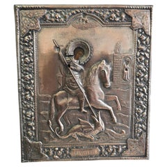 19th Century Icon of Saint George Slaying the Dragon with Repoussé Copper Oklad