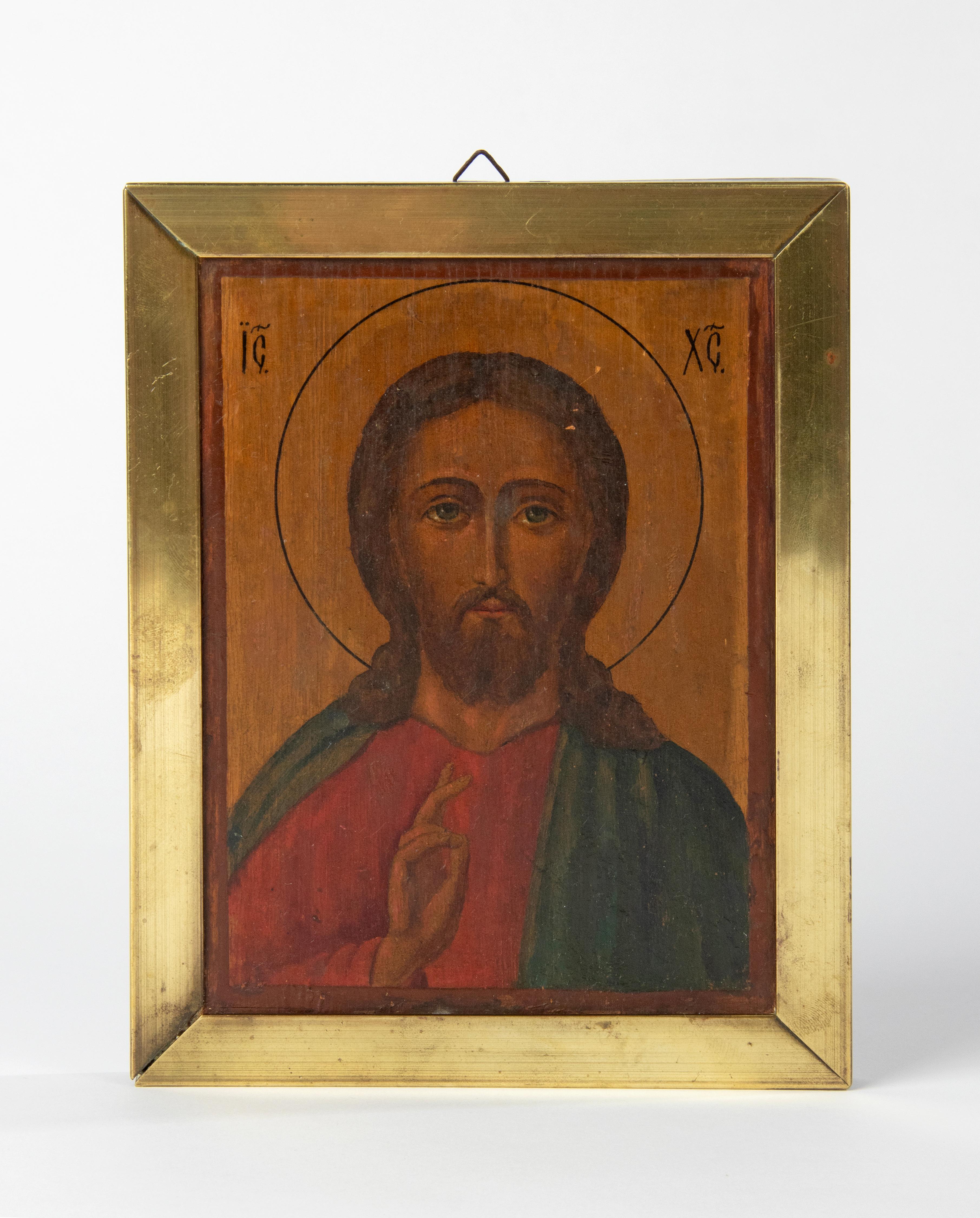 A beautiful antique icon of Jesus Christ. Hand painted, oil on panel. The icon is not signed, maker and origin unknown. Presumably French. The painting is framed in a simple brass frame.
The icon is in good condition. Free shipping
