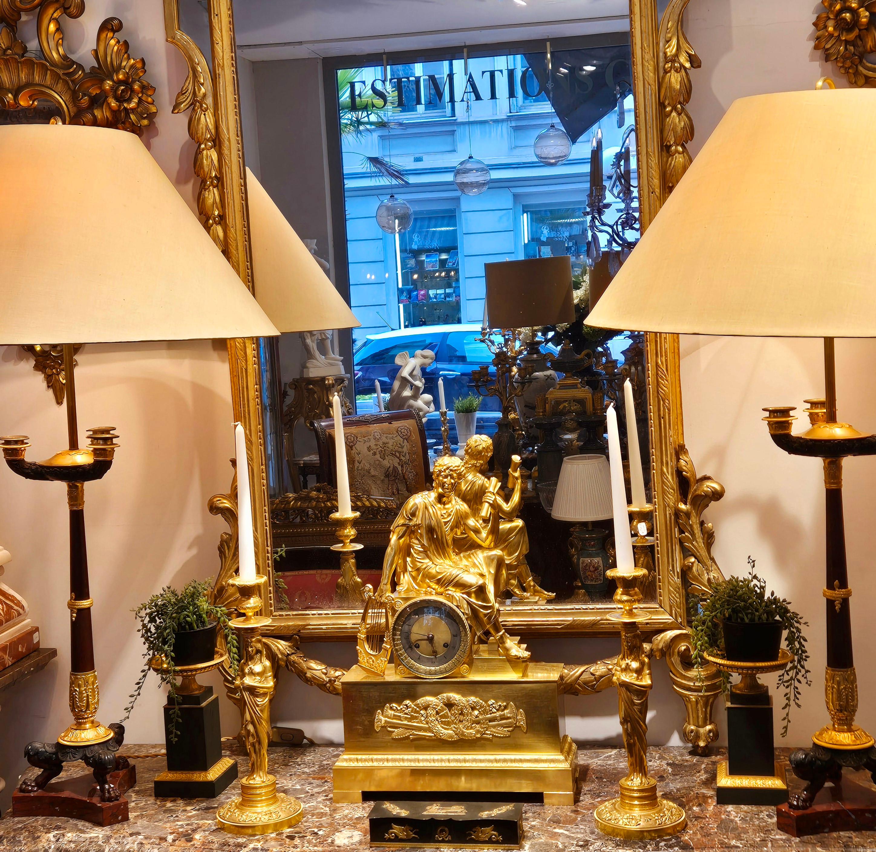 Pareja de candeleros Retour d'Egypte de bronce dorado, época Imperio, S. XIX Francés en venta