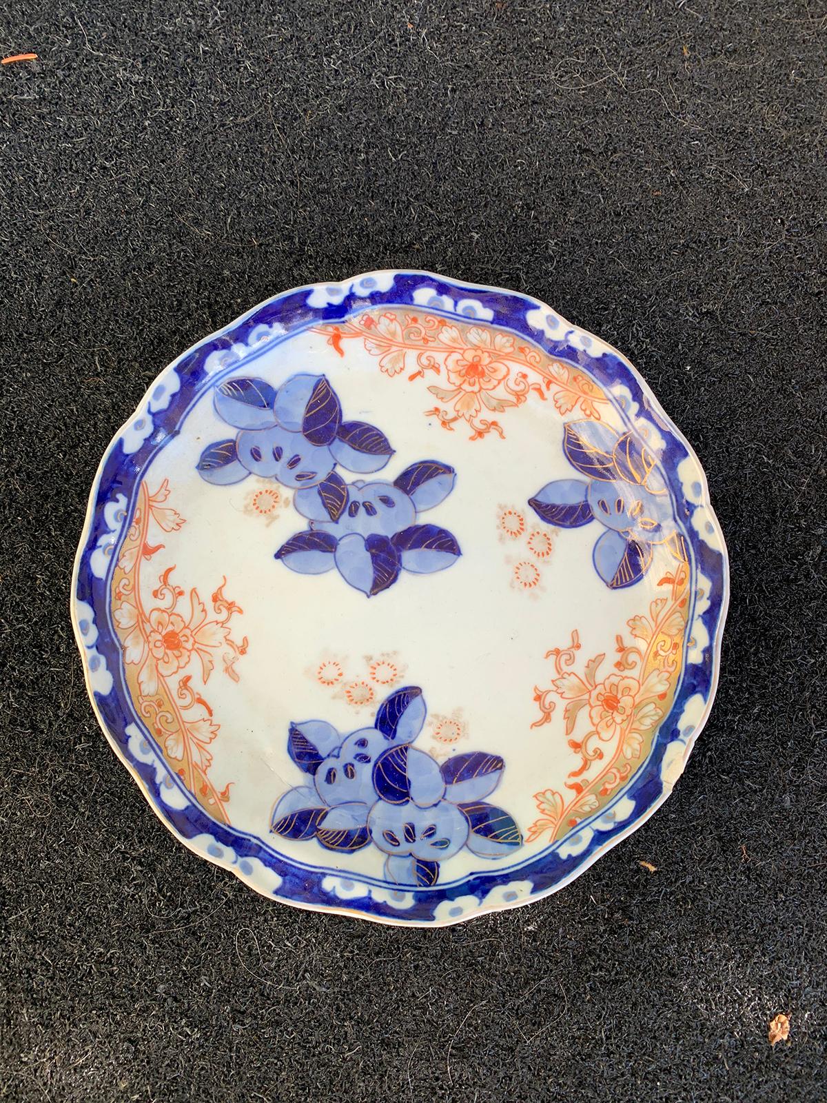19th century Imari style orange and blue porcelain plate with gilt details, scalloped edge.