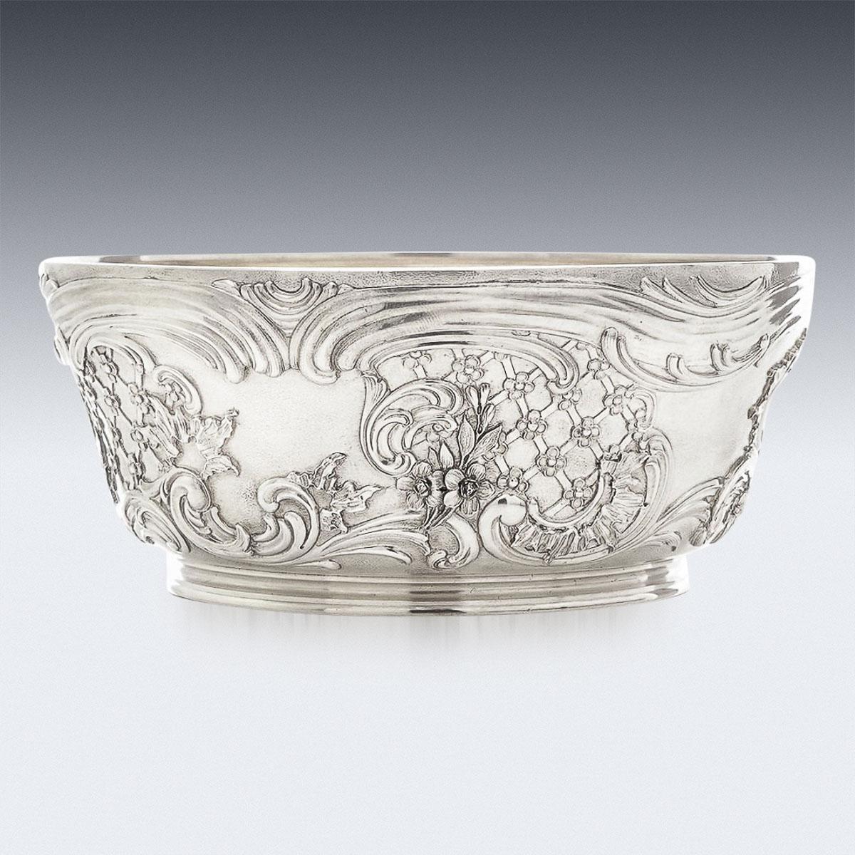 19th Century Imperial Russian silver presentation bowl in the Rococo style decorated with gilding and embossing with the inscription “From the Czar of Russia to Sir Myles Fenton 1894” engraved in the cartouche (“from the Russian Tsar to Sir Michael
