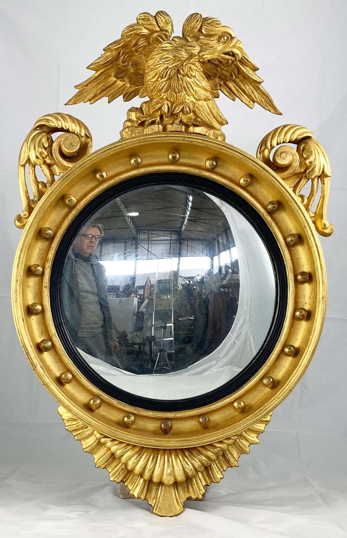 English 19th Century Impressive Regency Giltwood Carved Convex Wall Mirror For Sale