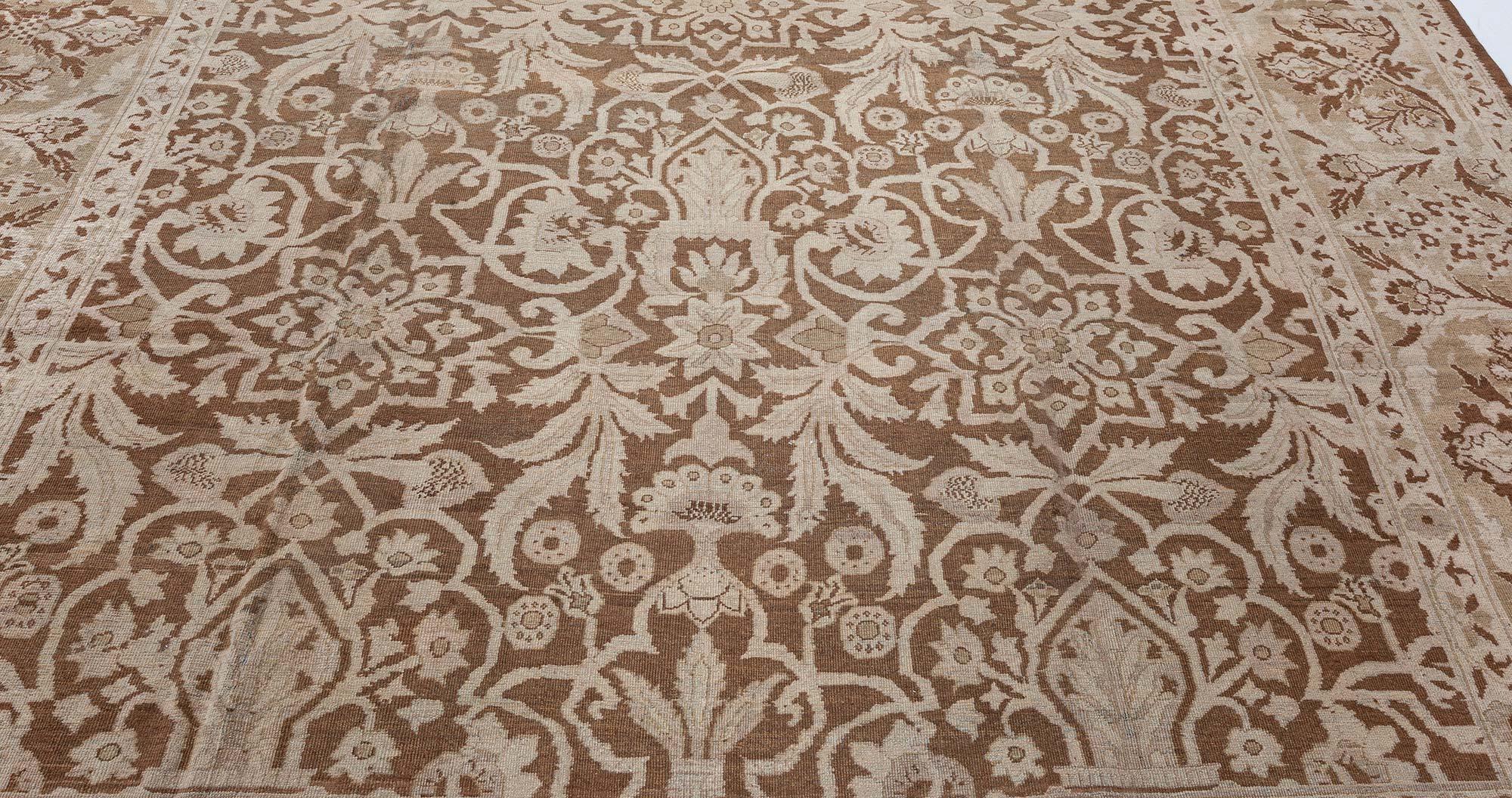 19th century Indian Amritsar botanic brown handwoven wool rug
Size: 11'5