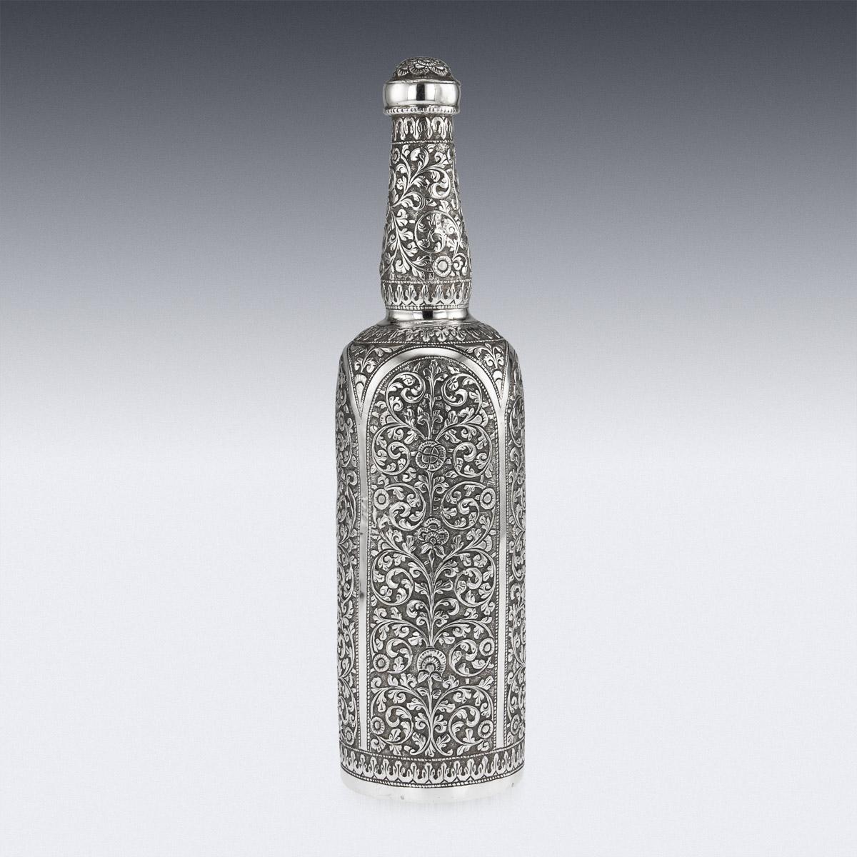19th Century Indian Cutch Solid Silver Repousse Wine Bottle, Bhuj, circa 1880 In Good Condition In Royal Tunbridge Wells, Kent
