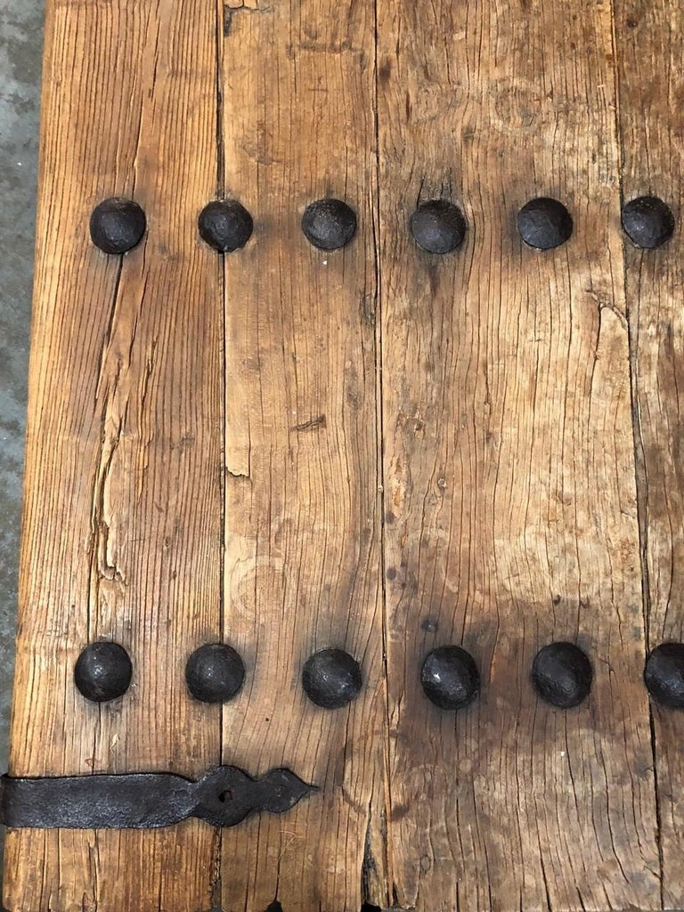 19th Century Indian Door with Iron Accents Made into a Coffee Table For
