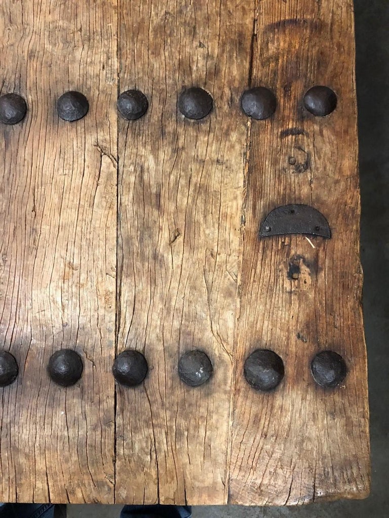 19th Century Indian Door with Iron Accents Made into a Coffee Table For