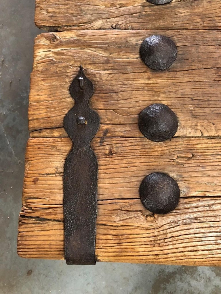 19th Century Indian Door with Iron Accents Made into a Coffee Table For
