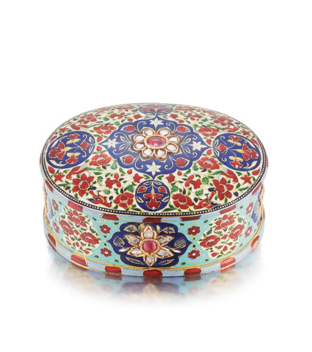 19th century Indian enamel gold box

Set with polki diamonds

Dimensions: approximately 2.63 x 1.88 inches

Weight: 175.7 grams

Circa 1850.
