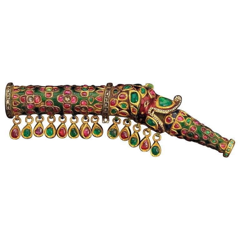 19th century Indian gemstone gold, & enamel water pipe/ hooka dragon head mouth piece
Elaborate & luxurious, this 19th century museum one of a kind Hooka/water pipe gold mouth piece is an eye opener. With A carved floral motif consisting of rubies