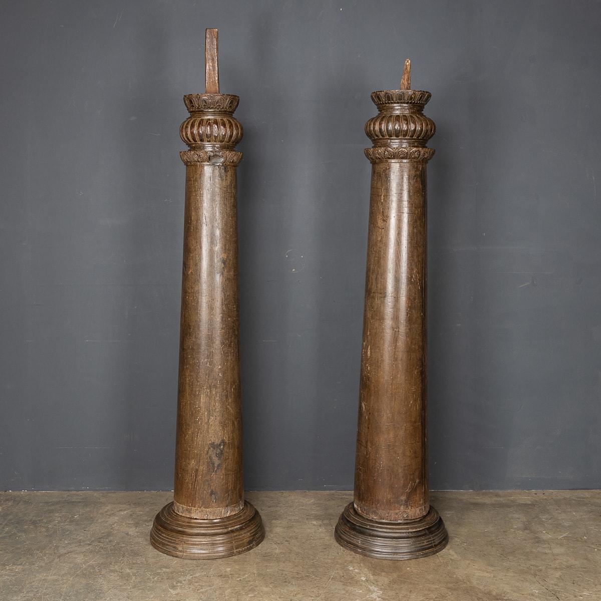 Antique mid-19th century Indian pair of hard wood, hand carved architectural columns.

Condition
In great condition - No Damage.

Size
Height: 163cm
Base Diameter: 42cm.