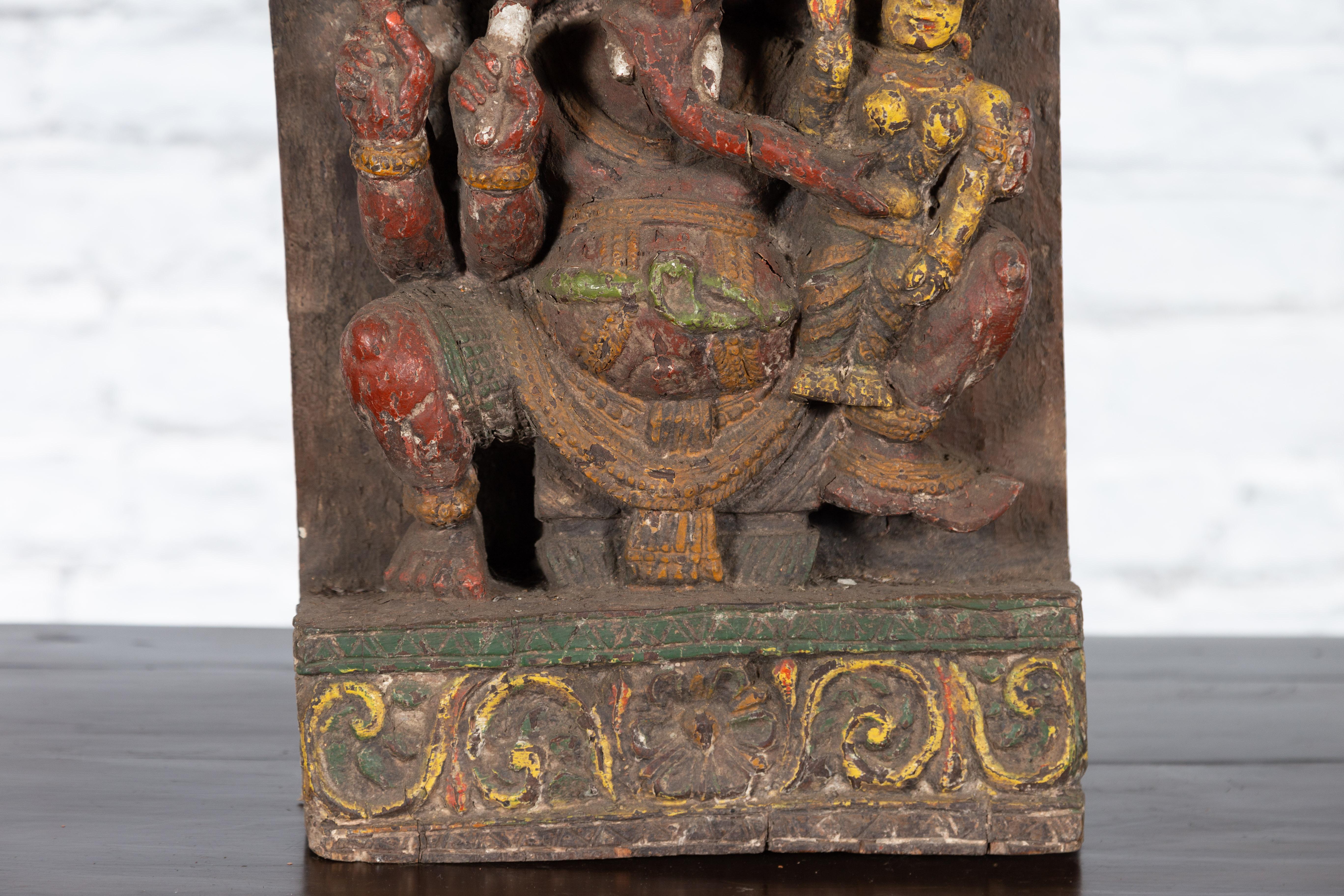 Wood 19th Century Indian Multicolor Temple Carving Depicting Ganesha with Consort For Sale