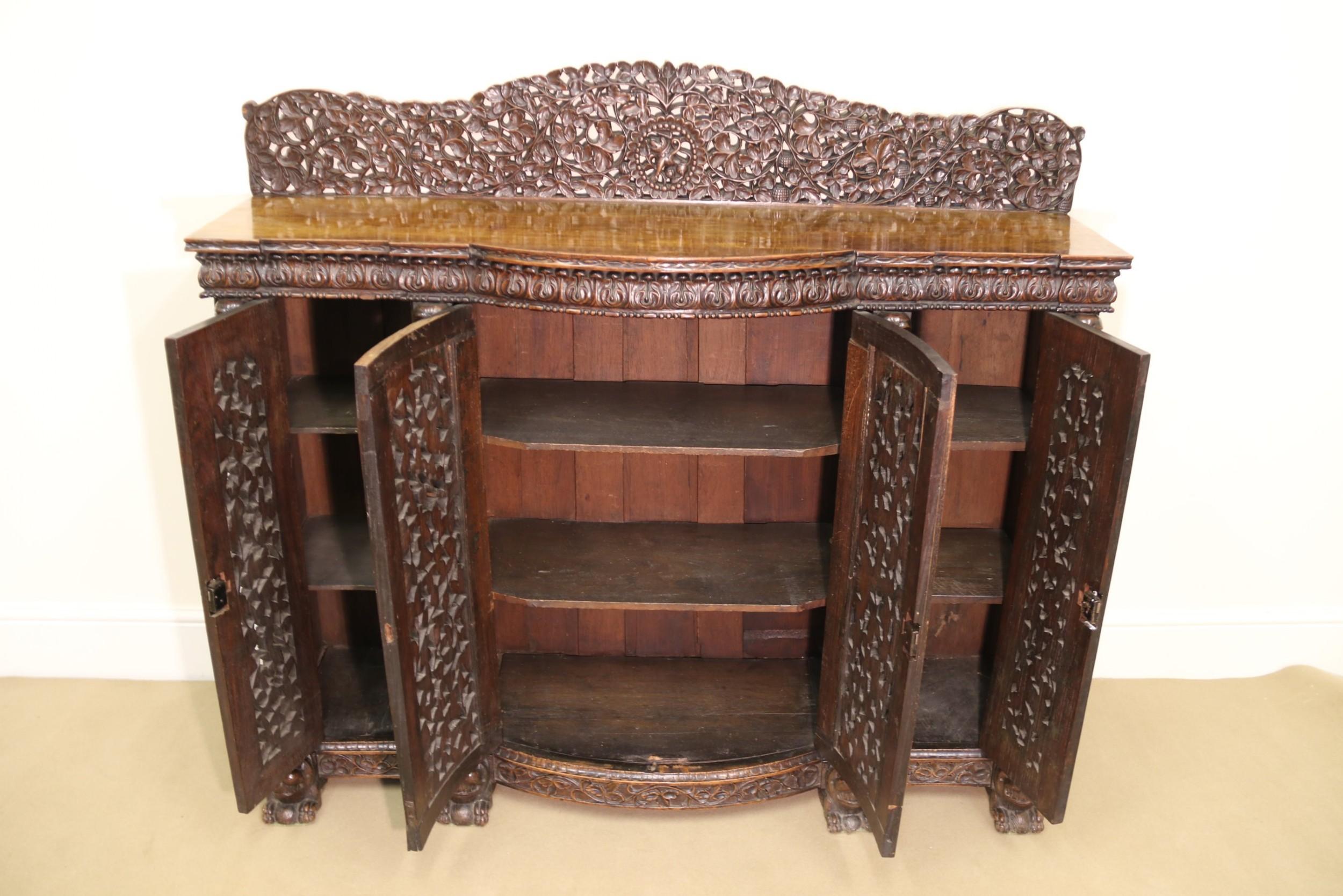 19th Century Indian Ornately Carved Padauk Wood Four-Door Side Cabinet For Sale 9