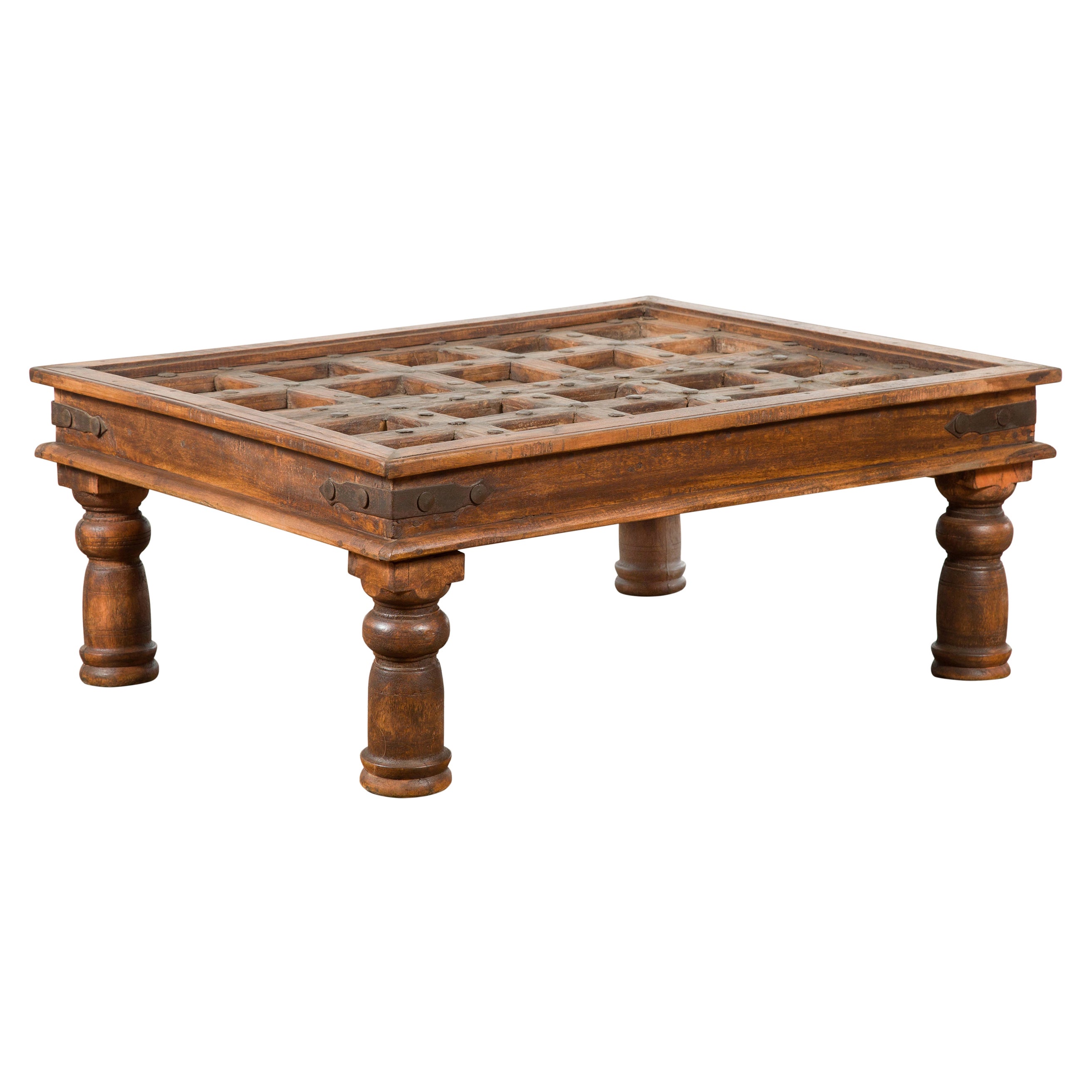 19th Century Indian Paneled Door with Iron Accents Turned into a Coffee Table