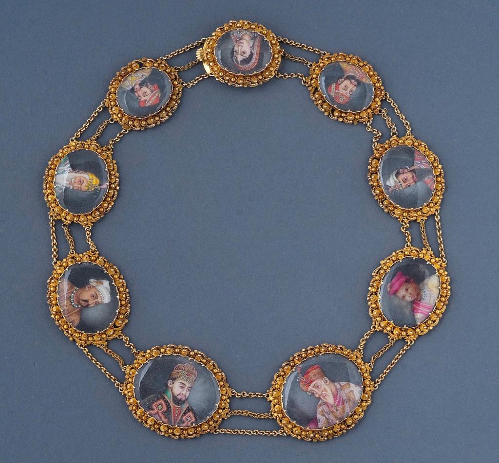Fine Indian gold necklace comprising nine painted oval portrait miniatures, including Maharaja Ranjit Singh, (1780-1838).