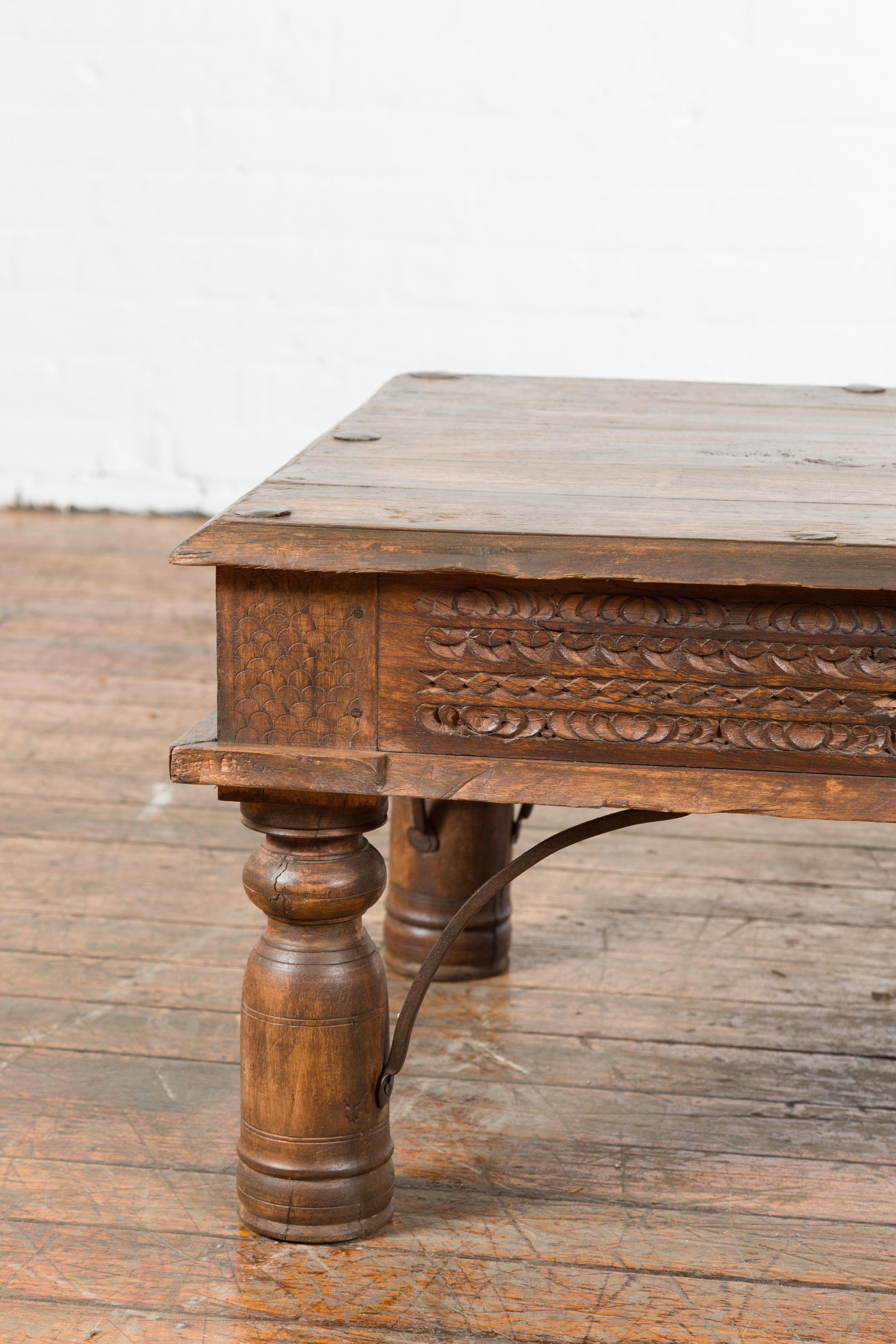 19th Century Indian Rustic Coffee Table with Carved Apron and Iron Accents In Good Condition In Yonkers, NY