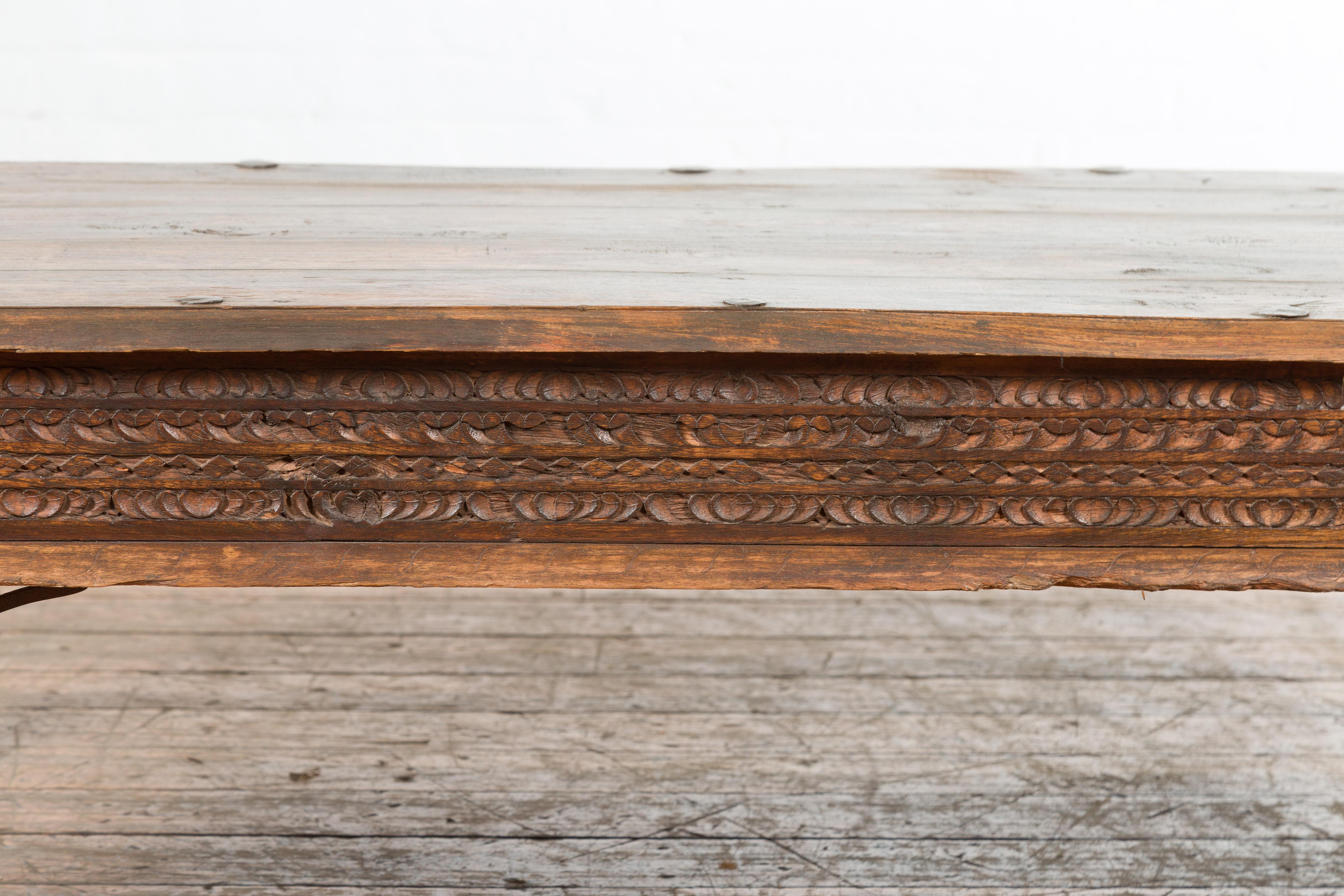 19th Century Indian Rustic Coffee Table with Carved Apron and Iron Accents 2