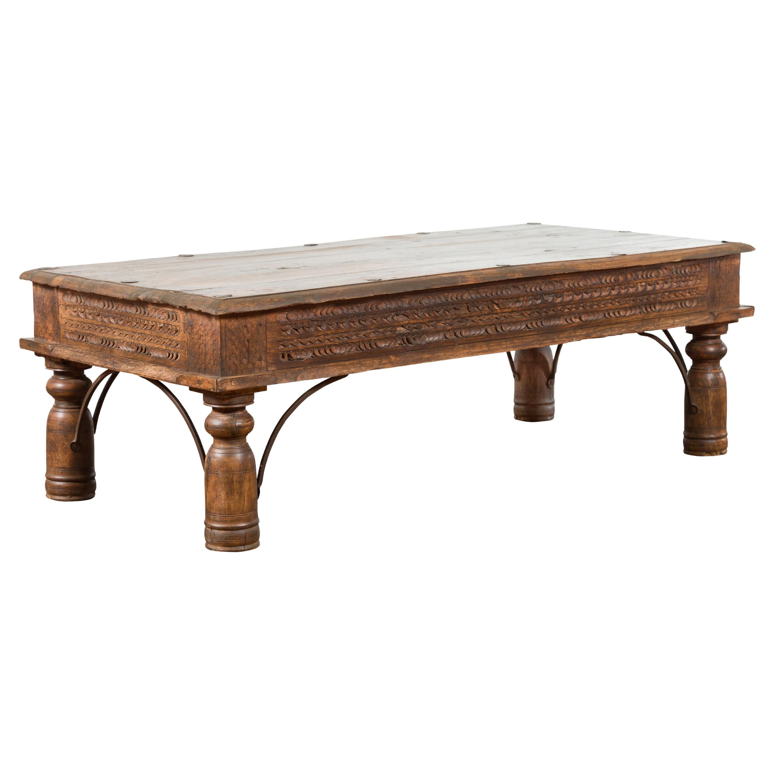 19th Century Indian Rustic Coffee Table with Carved Apron and Iron Accents